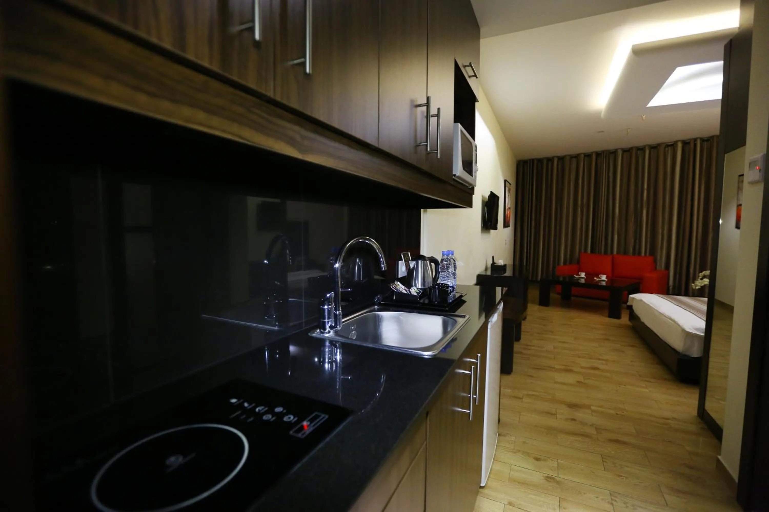 Kitchen or kitchenette, Bed in Jounieh Suites Boutique Hotel