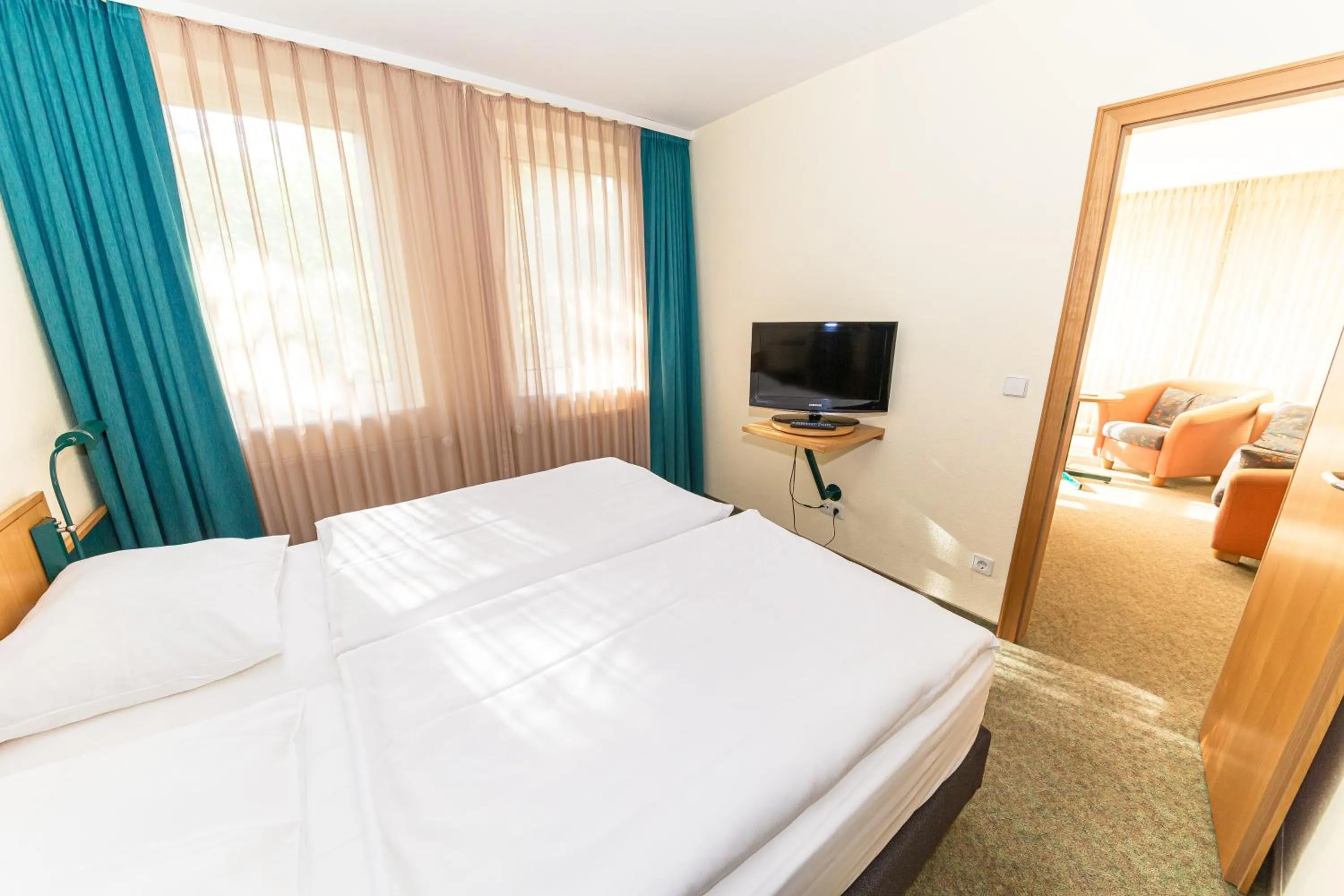 Photo of the whole room, Bed in Akzent Parkhotel Trebbin