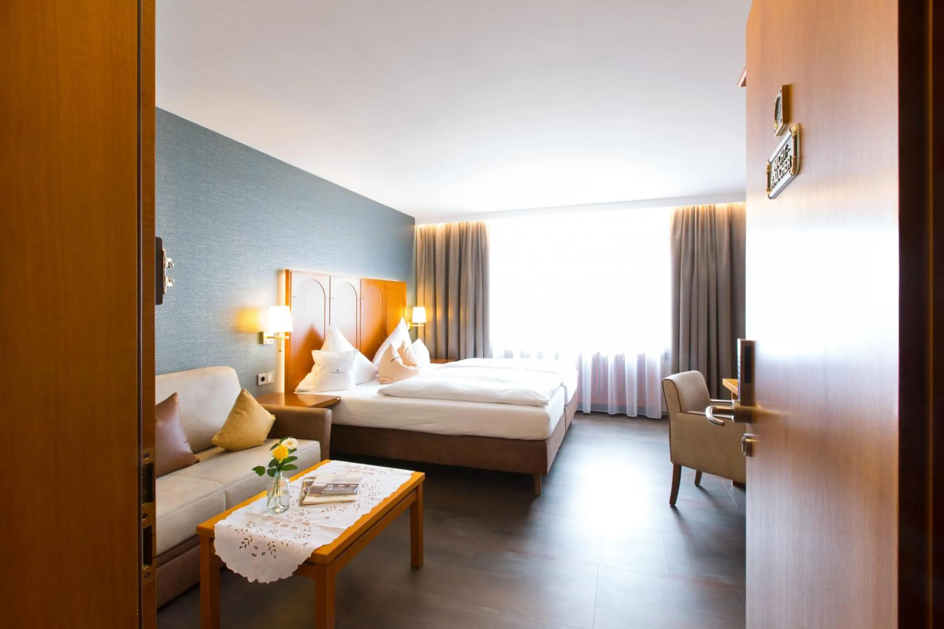 Bed in AKZENT Hotel Restaurant Altdorfer Hof