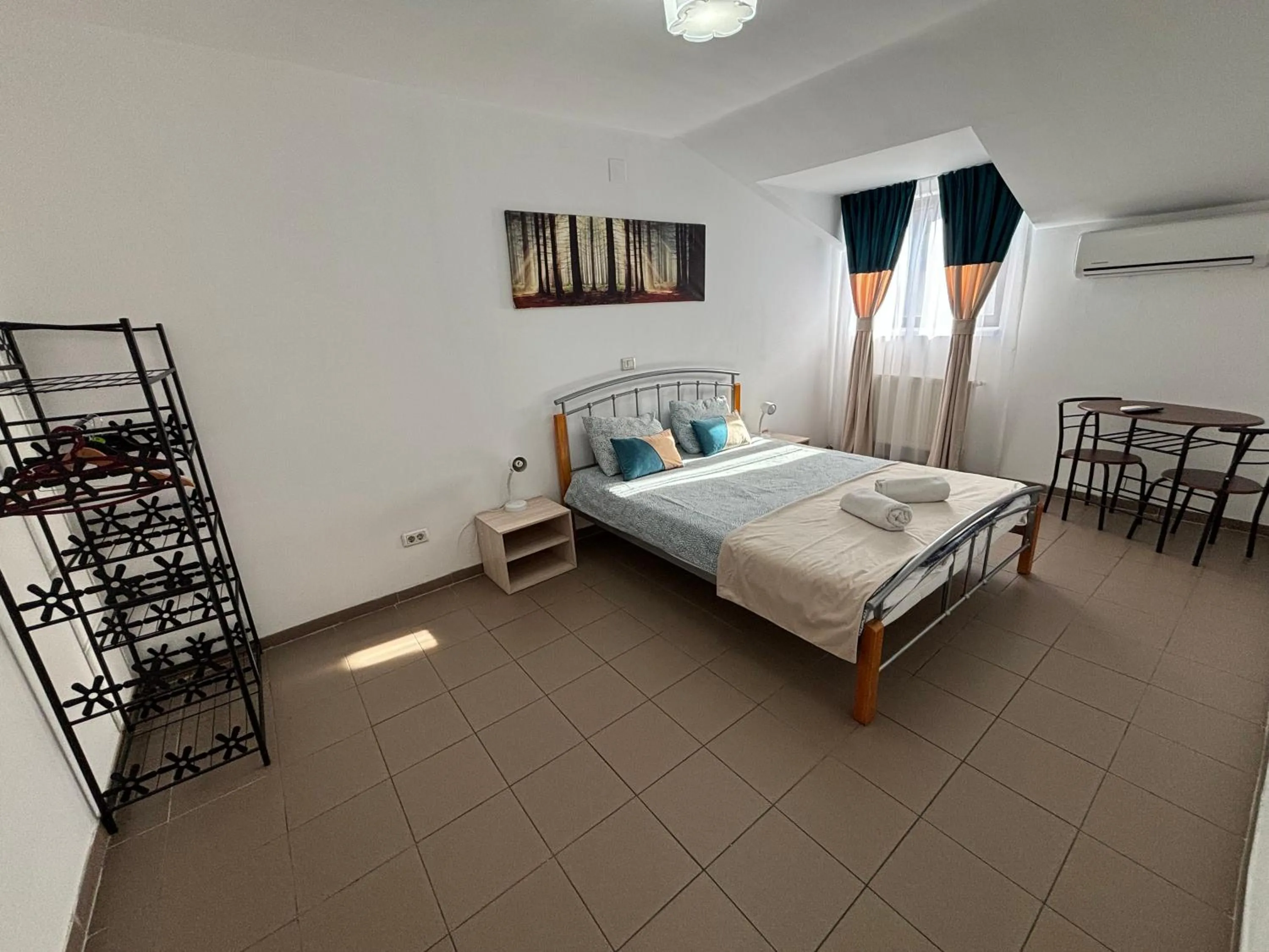 Bed in Piata Uniri Cozy Inn