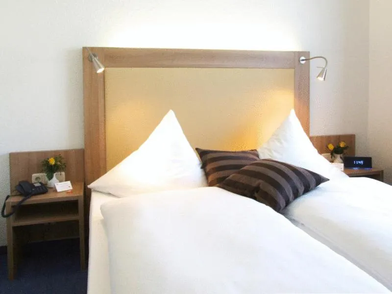 Photo of the whole room, Bed in Hotel Lousberg