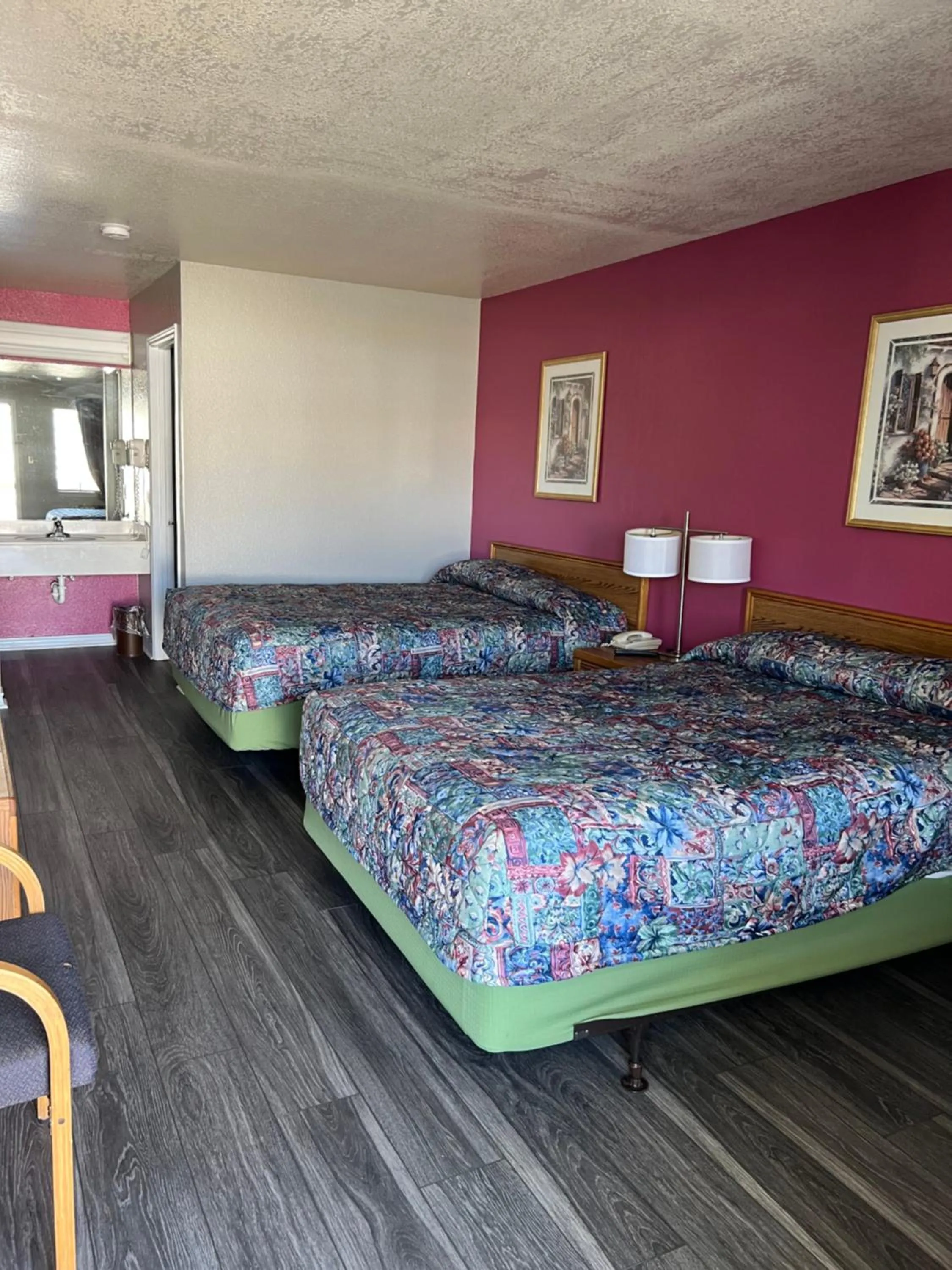 Bed in COUNTRY INN MOTEL