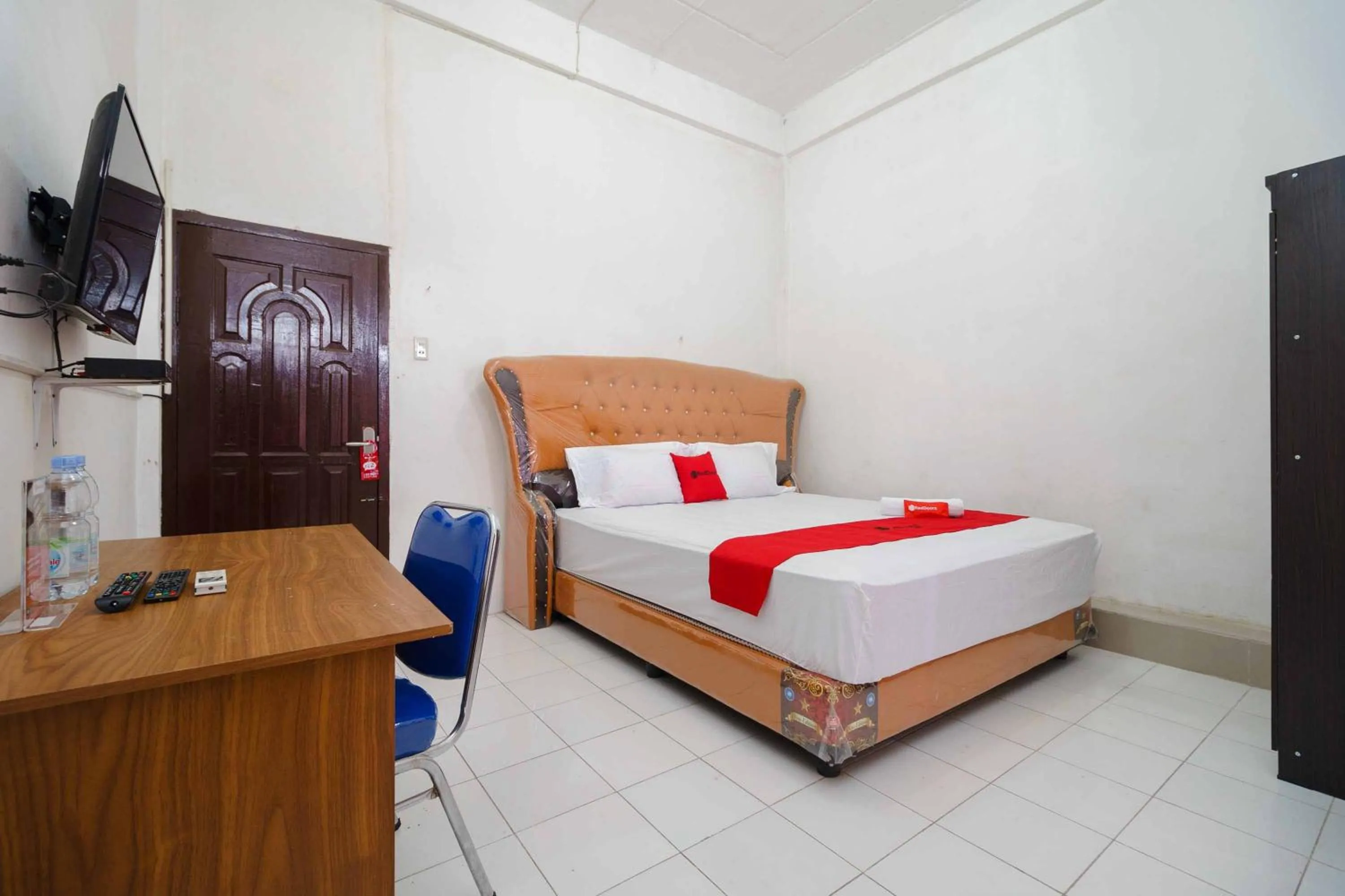 Bedroom in RedDoorz Syariah near Stasiun Kereta Api Kisaran