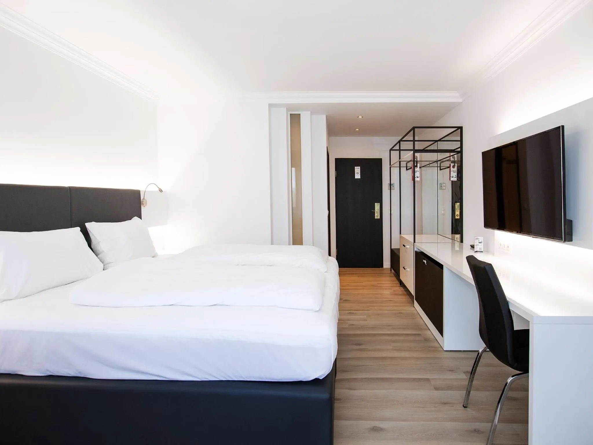 Photo of the whole room, Bed in DORMERO Hotel Meerbusch