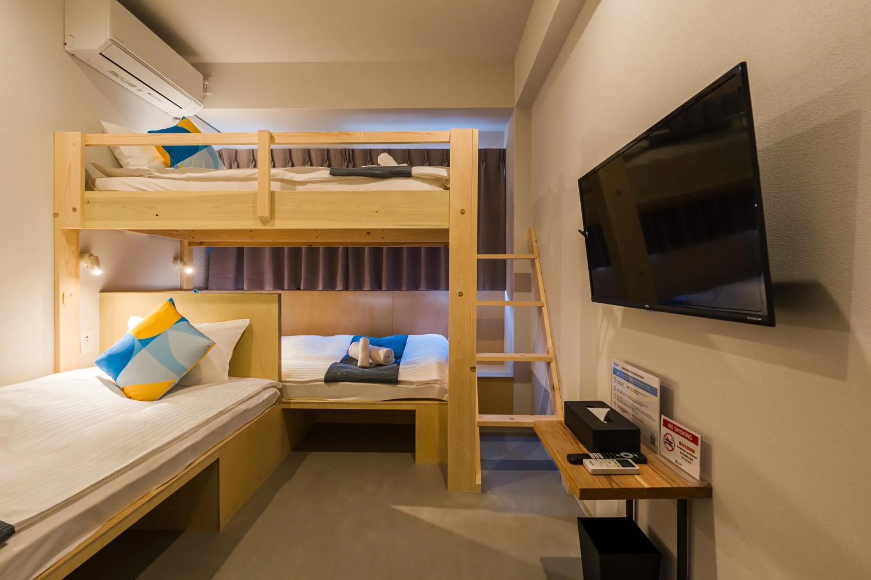 Bed in BAKURO - Doyanen Hotels