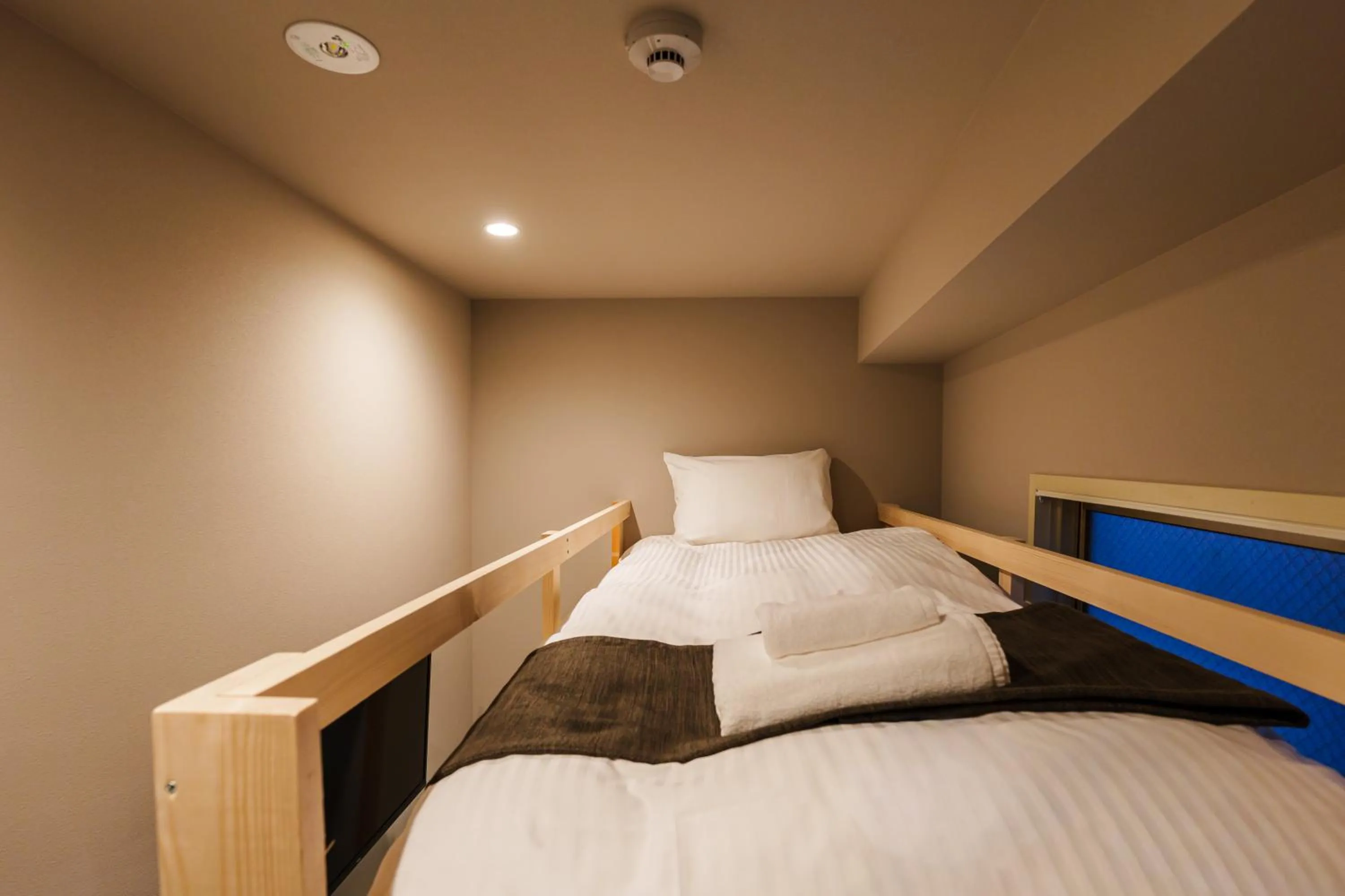 Bed in BAKURO - DOYANEN HOTELs