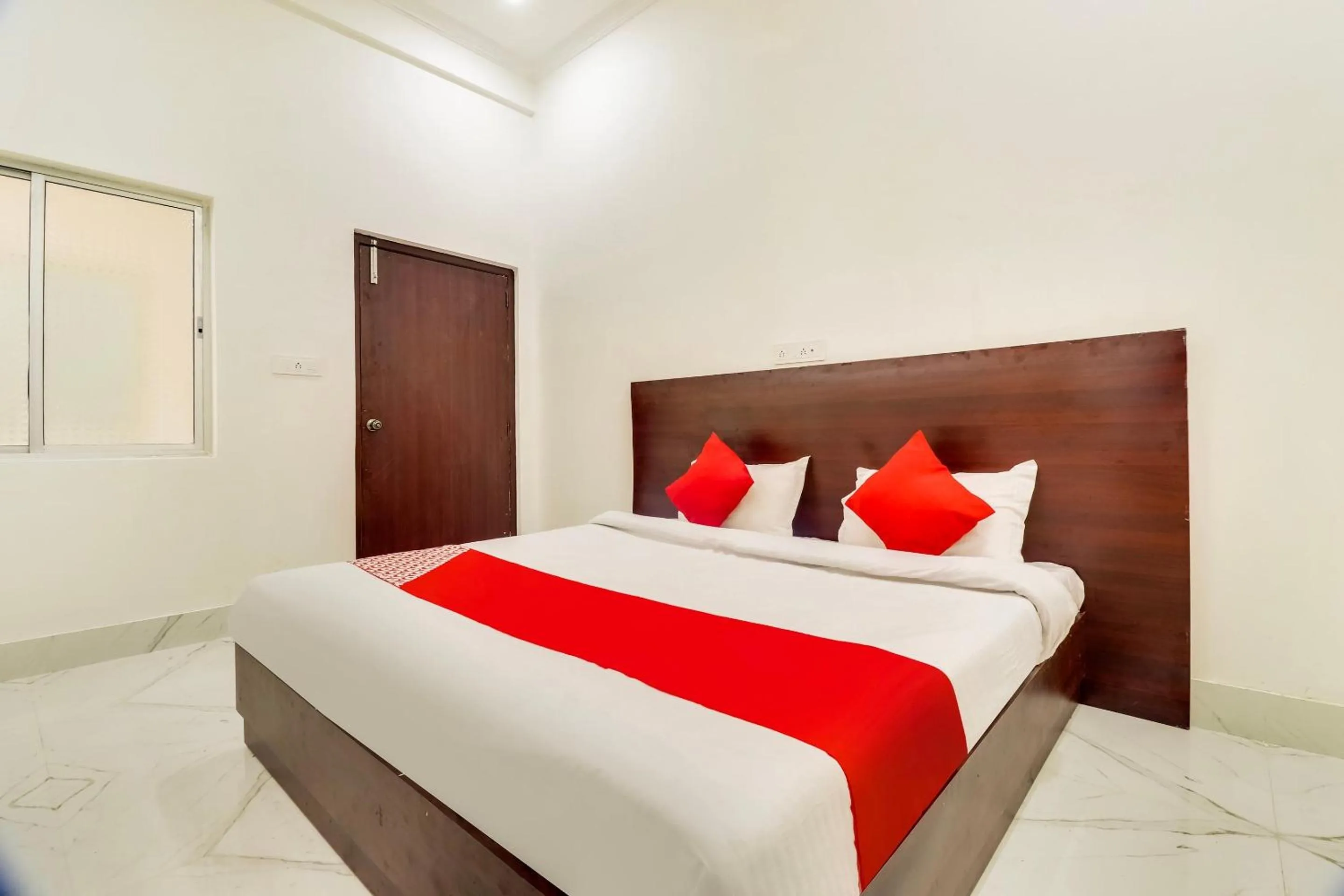 Bedroom in Hotel O Subham Residency