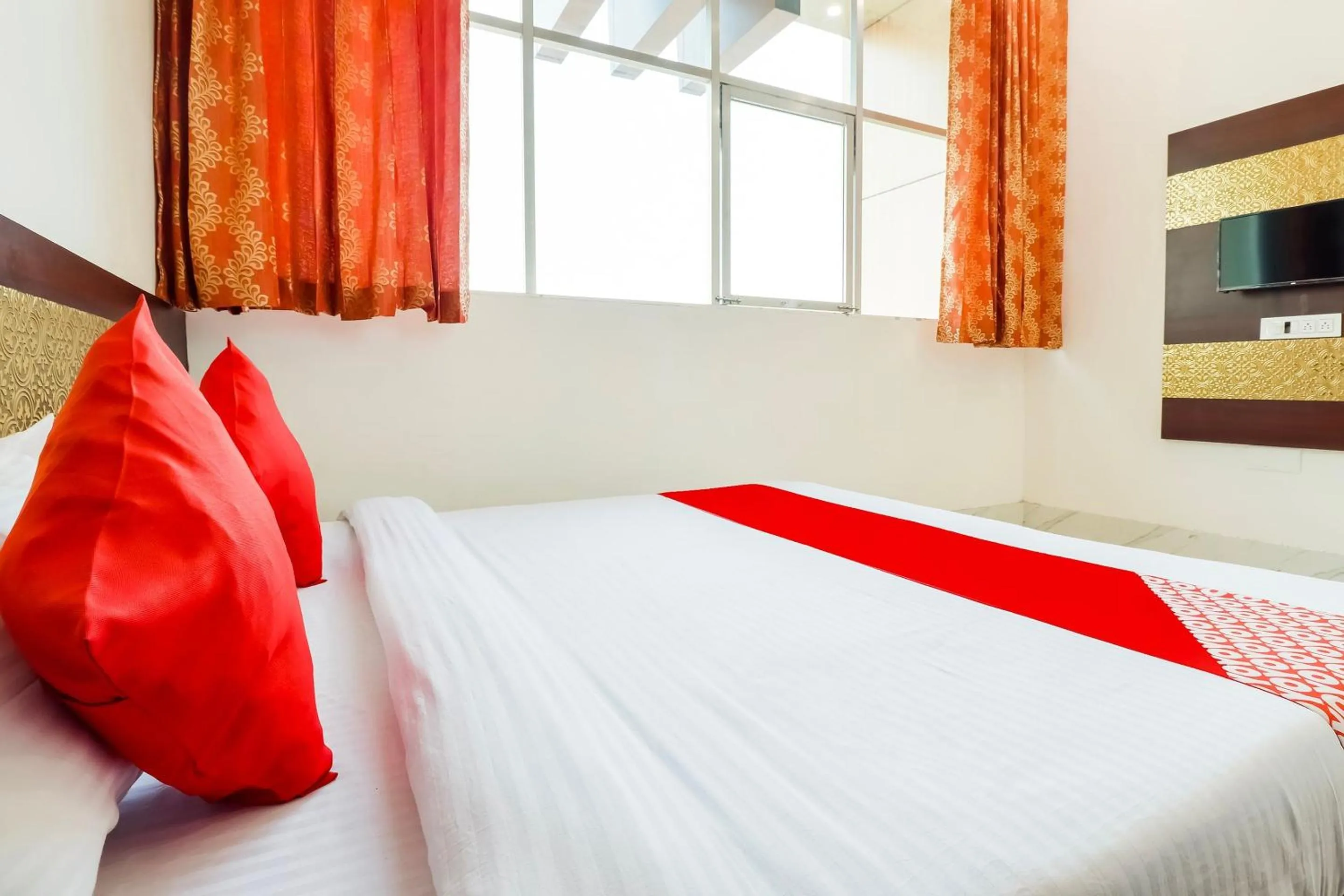 Bedroom in Hotel O Subham Residency