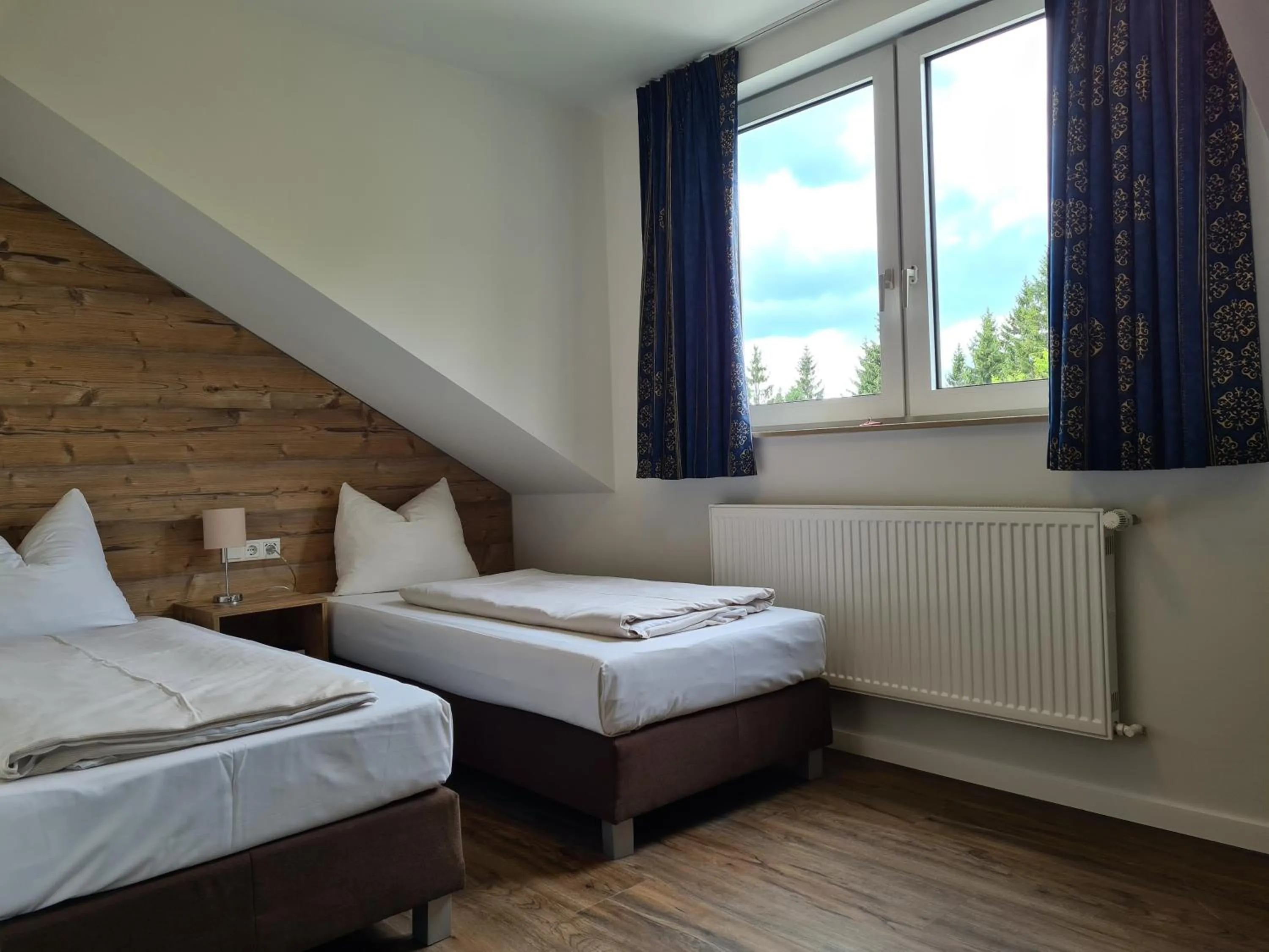 Photo of the whole room, Bed in Hotel Winterberg Resort