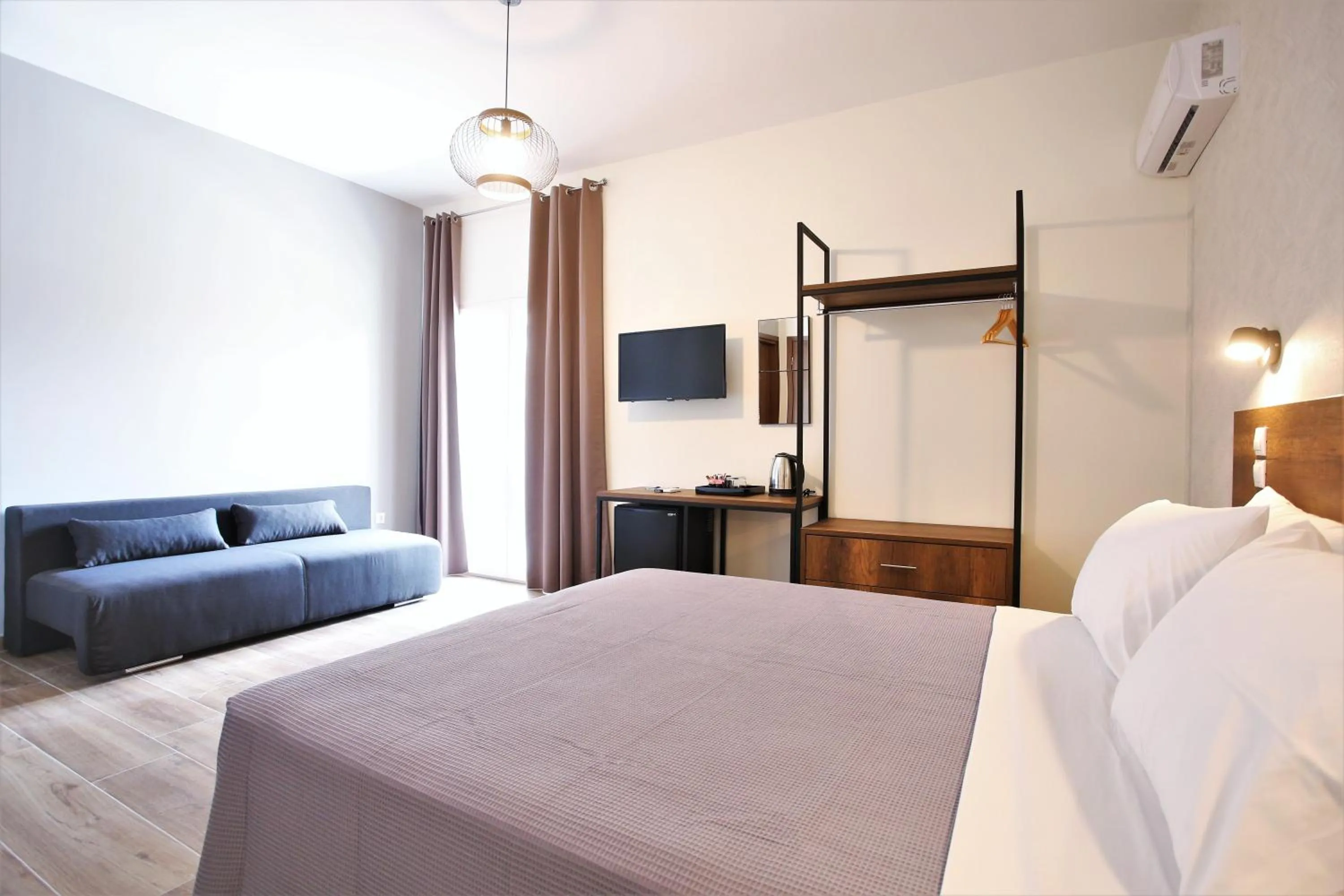 Photo of the whole room, Bed in Aethon Airport Project-FREE SHUTTLE by GK Properties