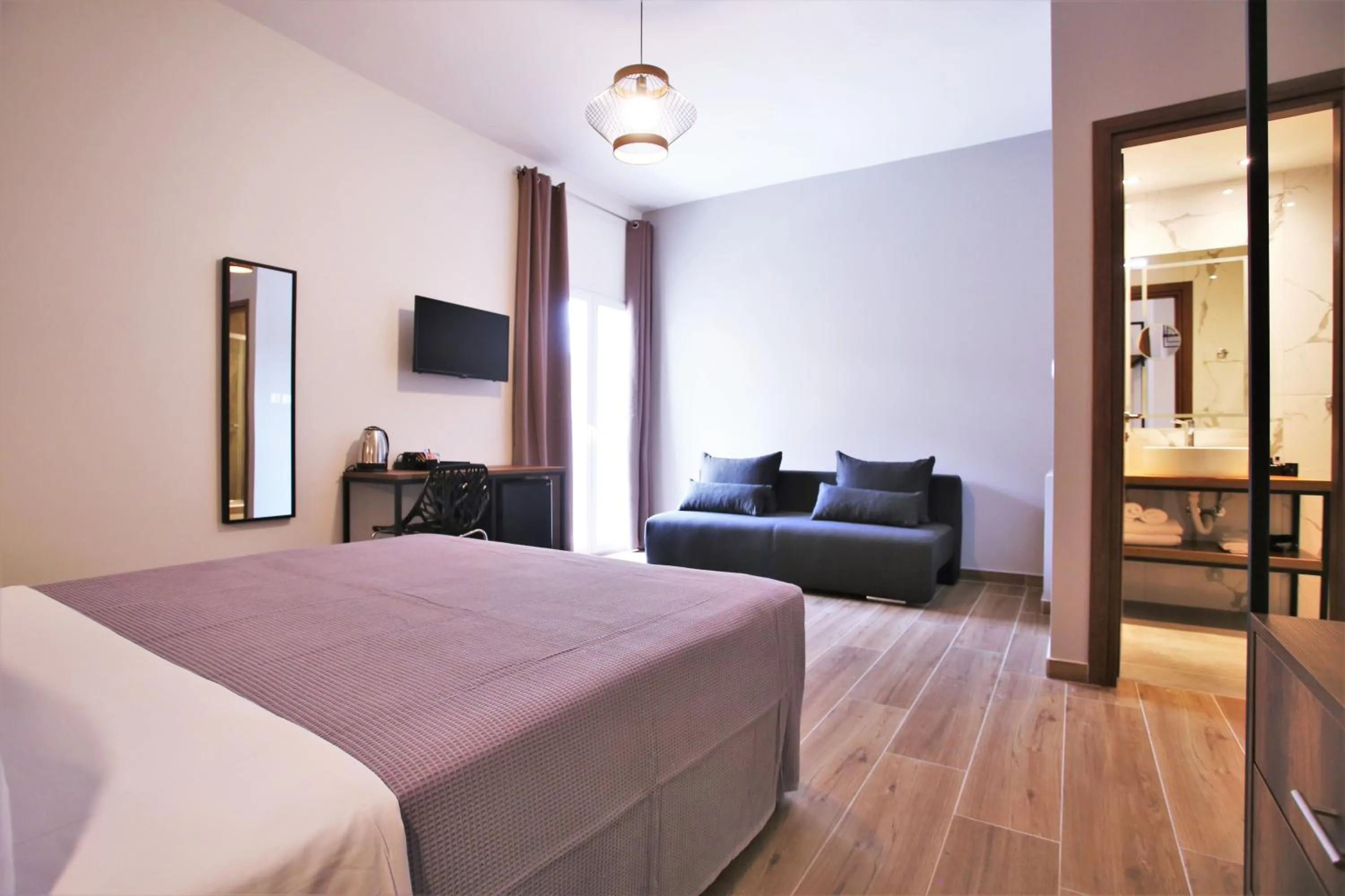 Photo of the whole room, Bed in Aethon Airport Project-FREE SHUTTLE by GK Properties