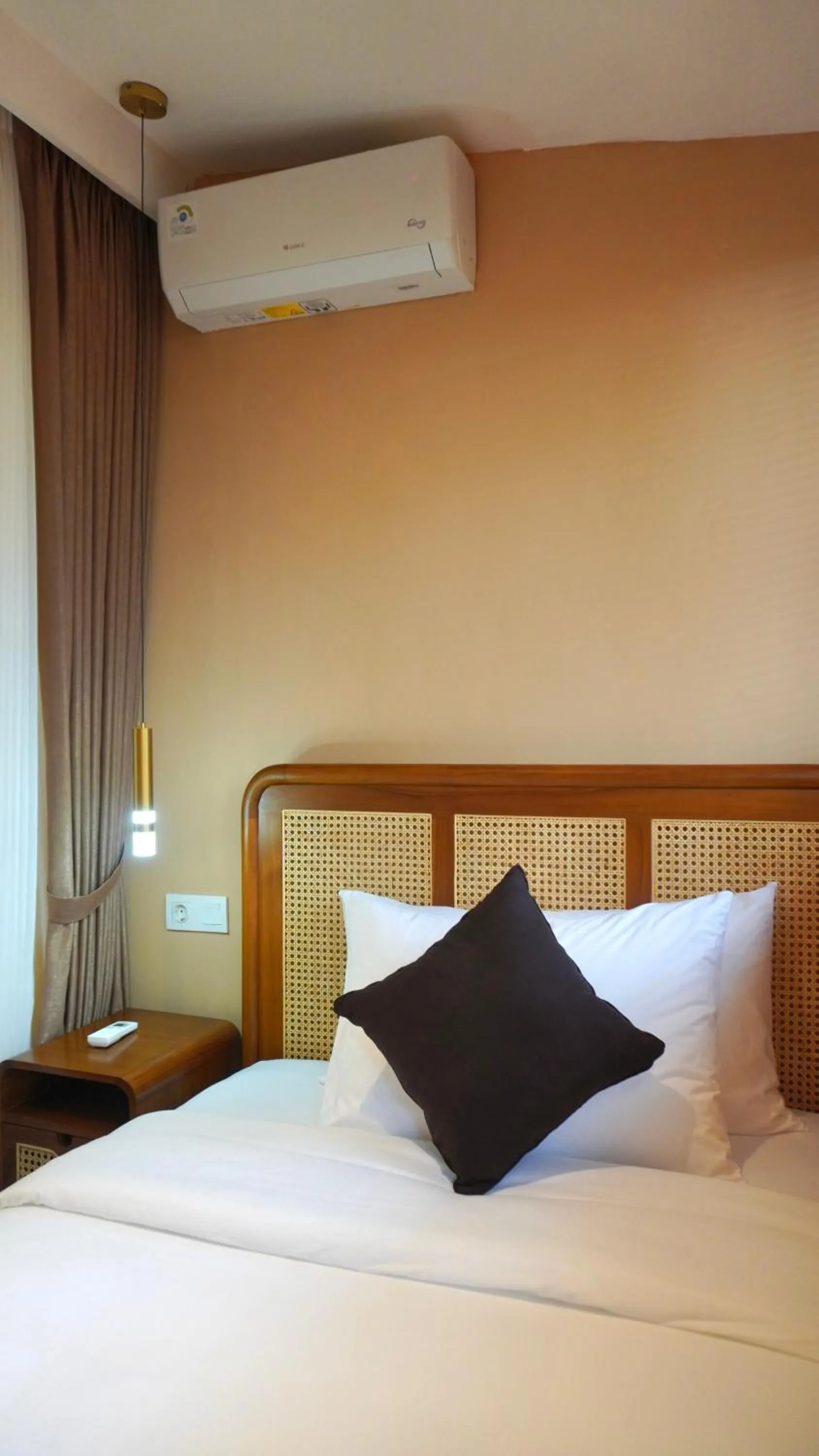 Bed in Luxury Malioboro Hotel