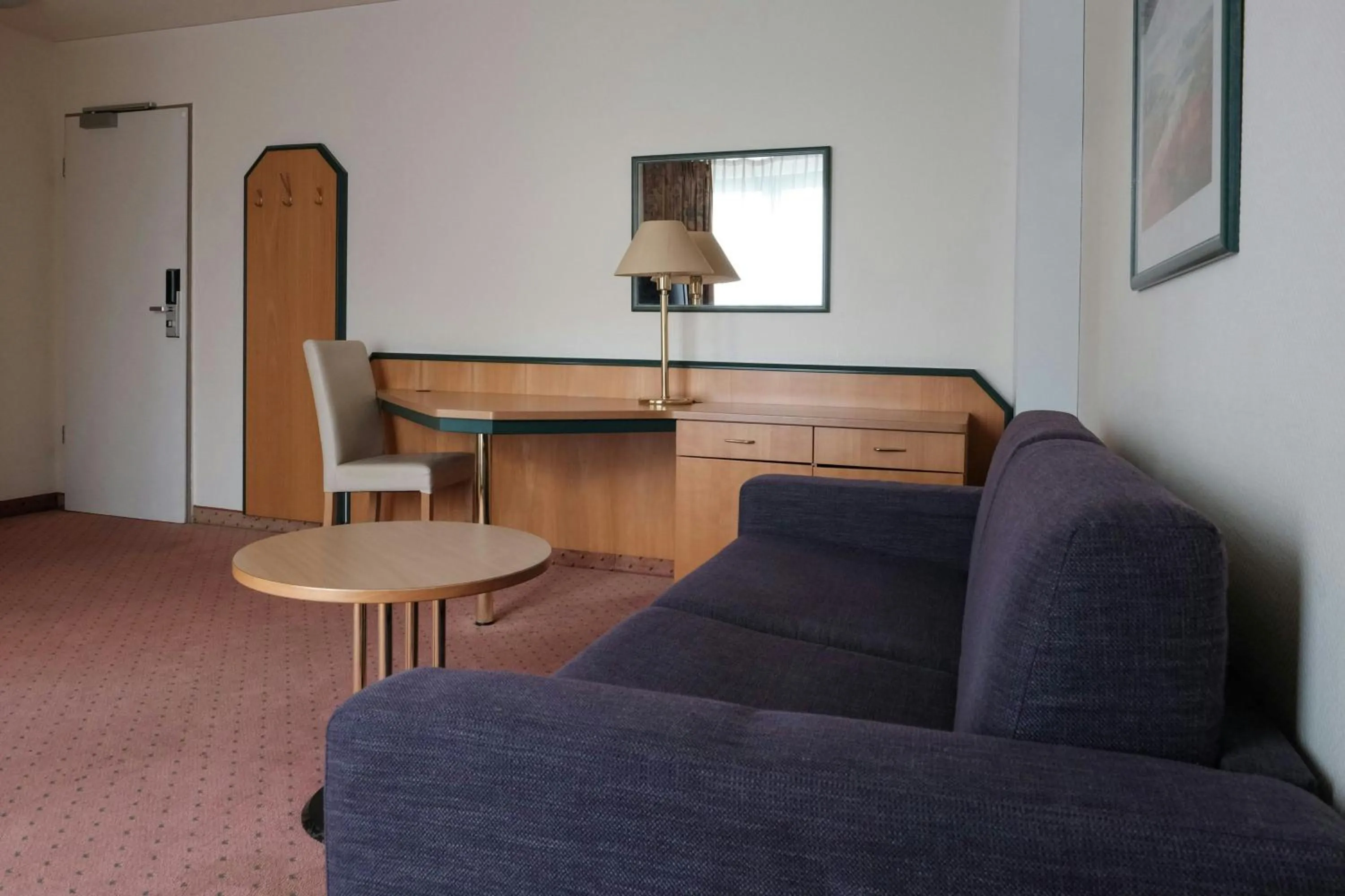 Living room in Holiday Inn Essen City Centre, an IHG Hotel