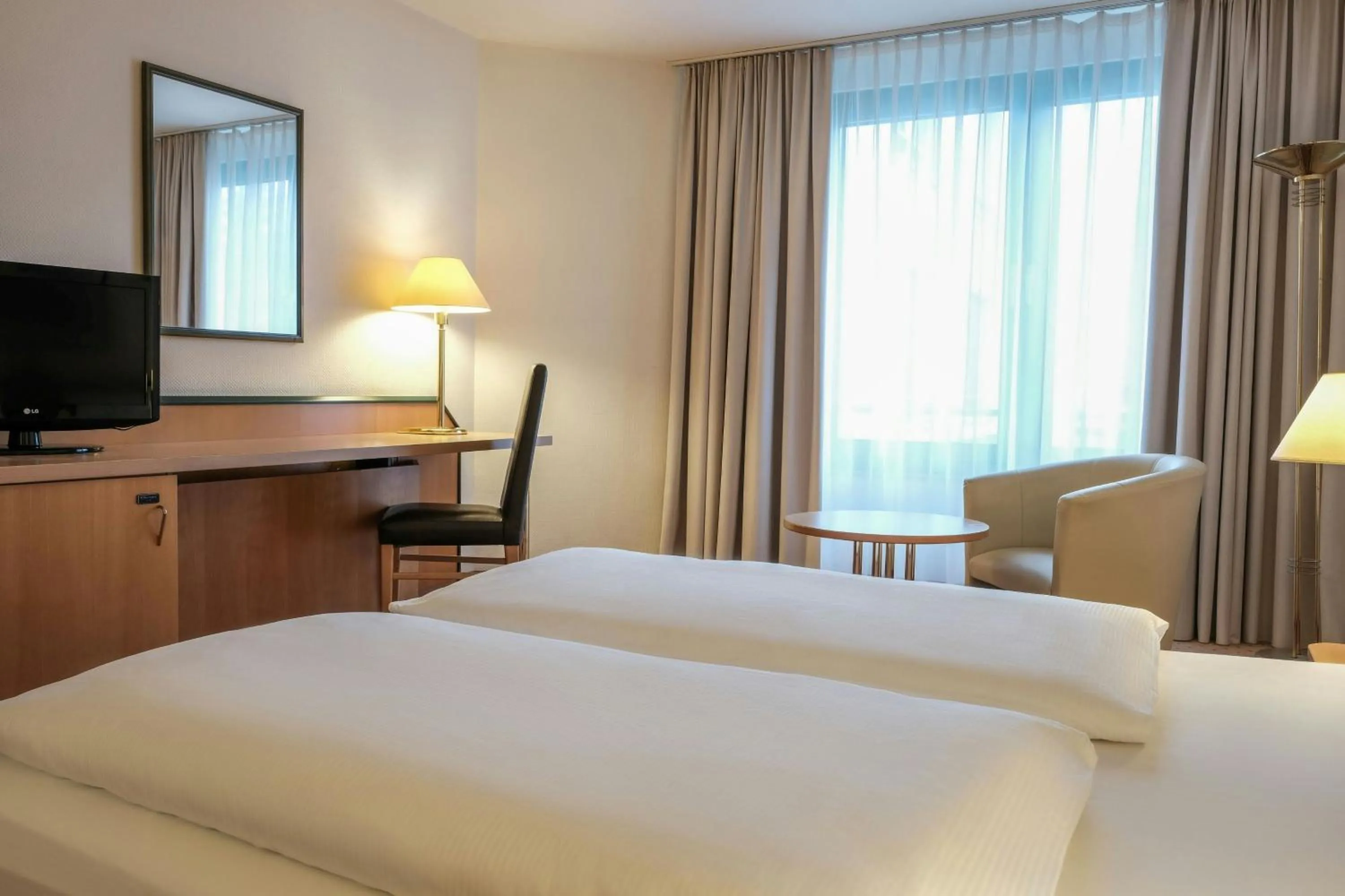 Photo of the whole room, Bed in Holiday Inn Essen City Centre, an IHG Hotel