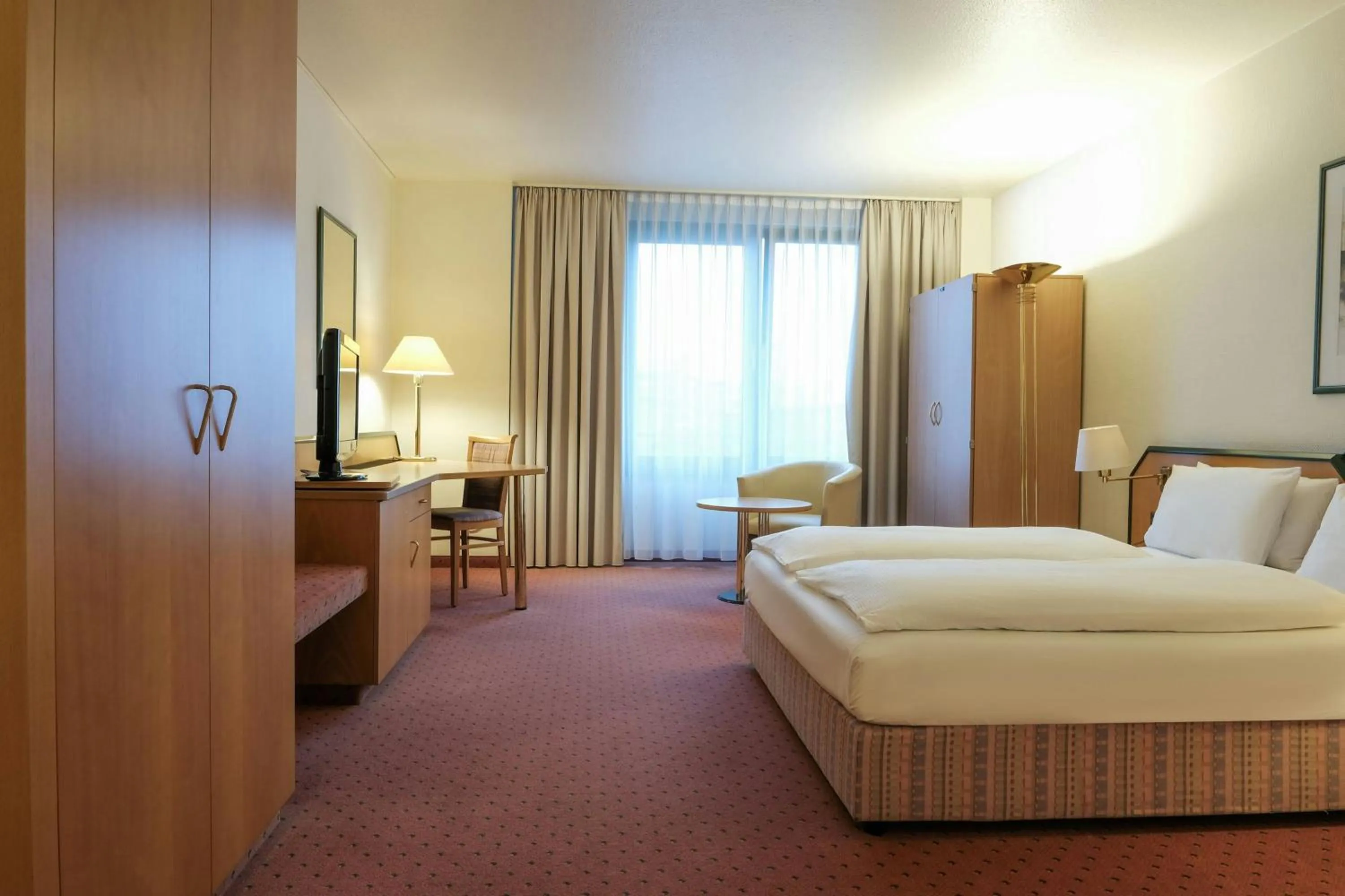 Photo of the whole room, Bed in Holiday Inn Essen City Centre, an IHG Hotel