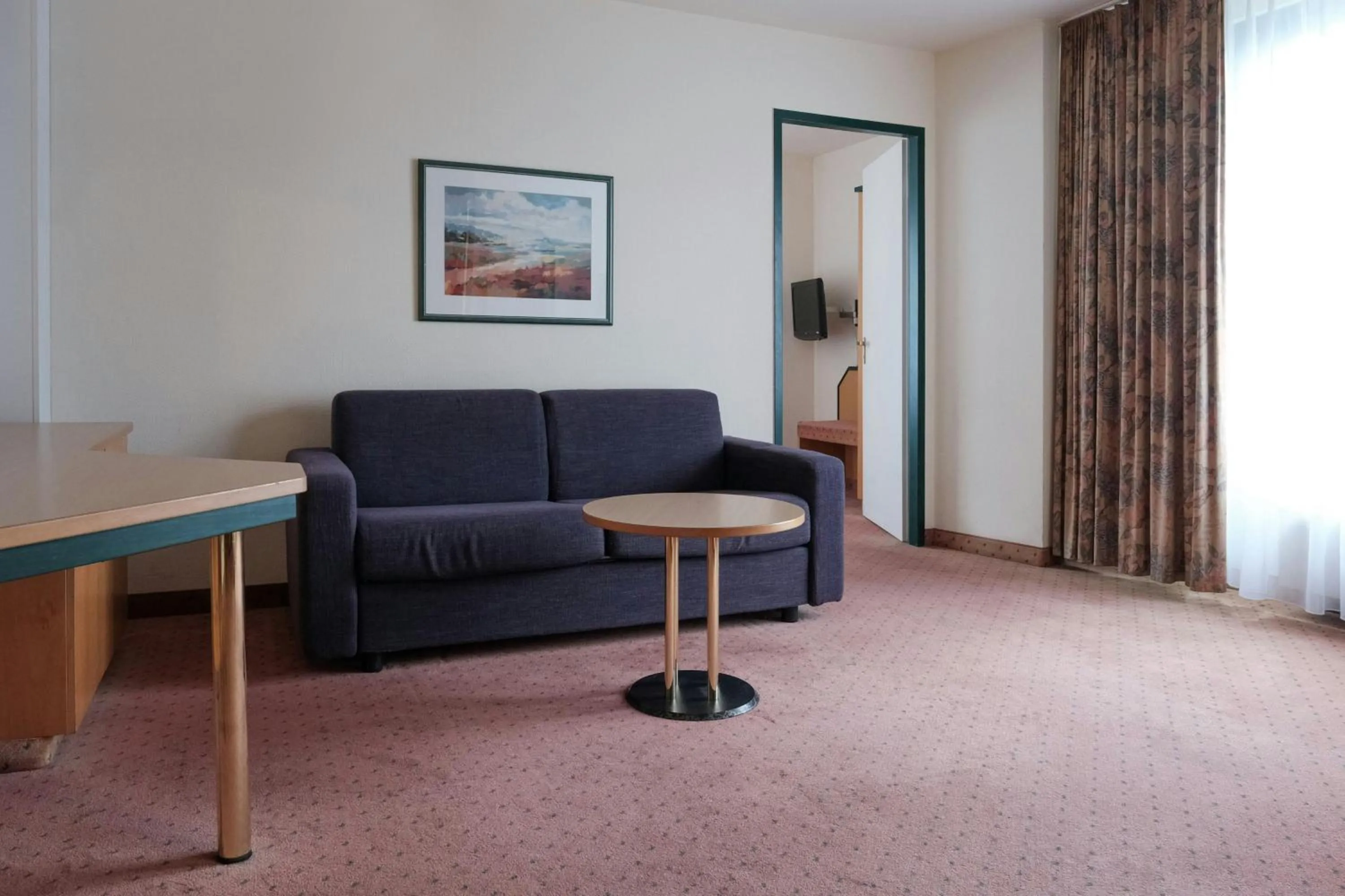 Living room in Holiday Inn Essen City Centre, an IHG Hotel