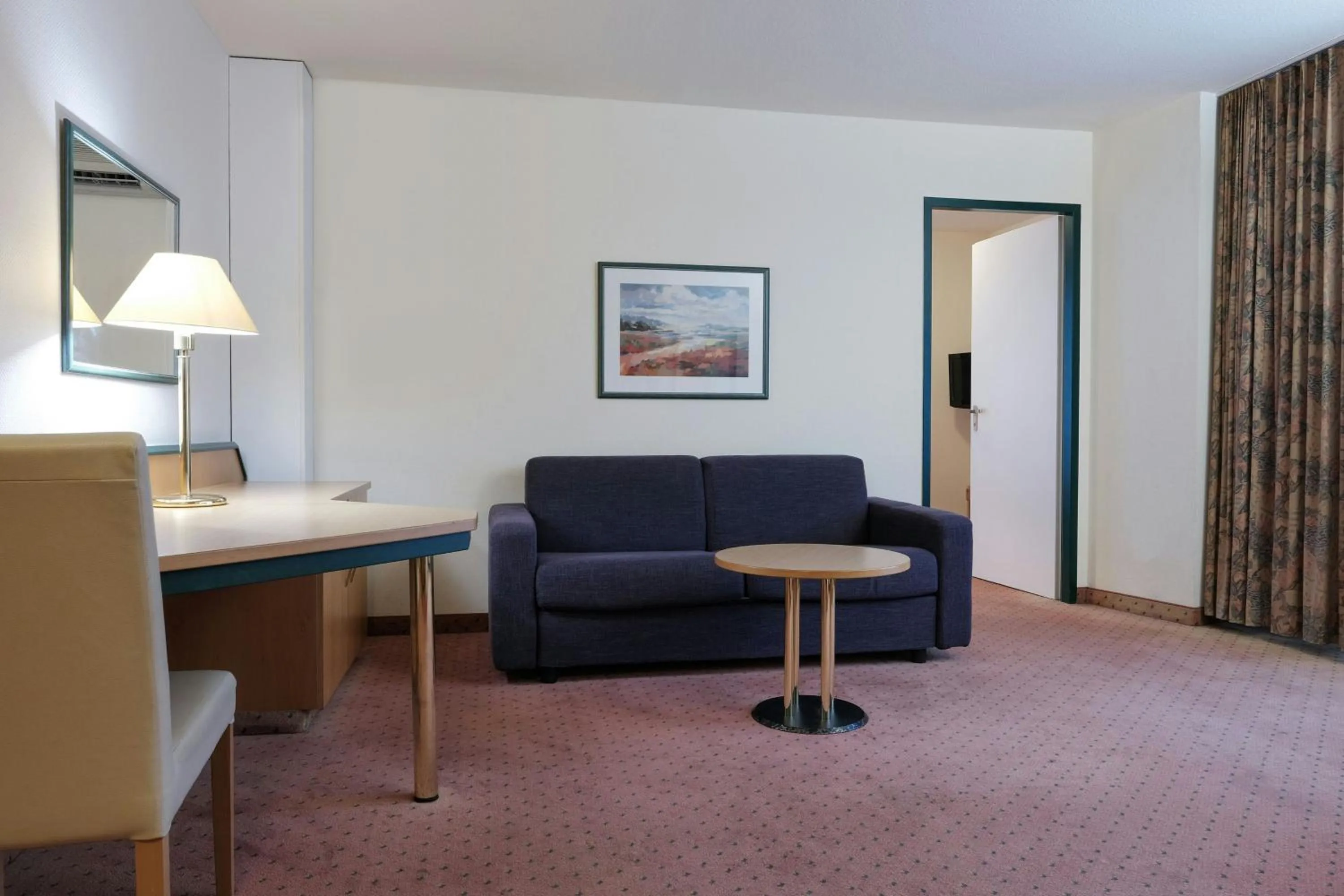 Living room in Holiday Inn Essen City Centre, an IHG Hotel