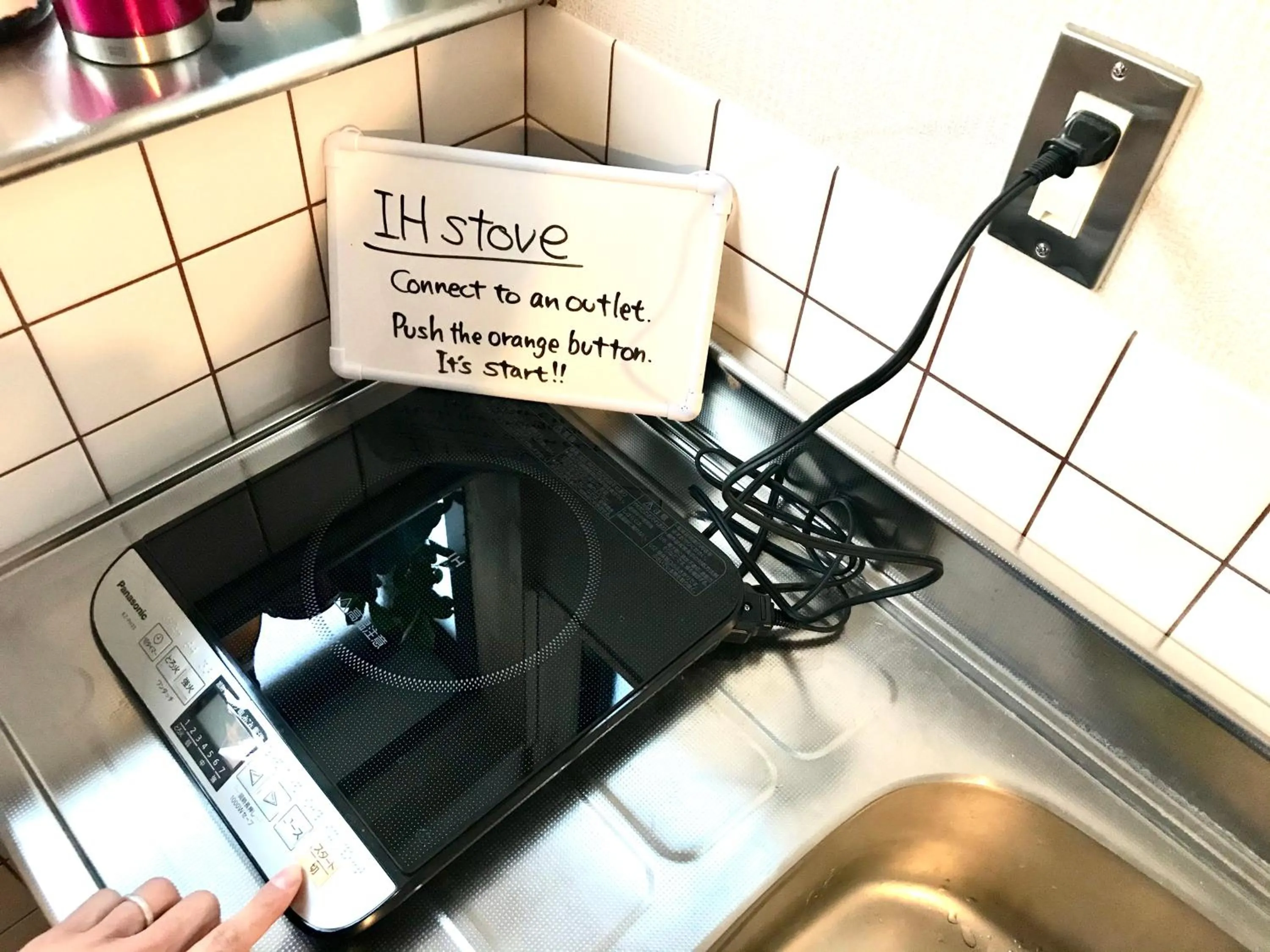 Kitchen or kitchenette in Backpackers Hostel TSUBAMENOYADO