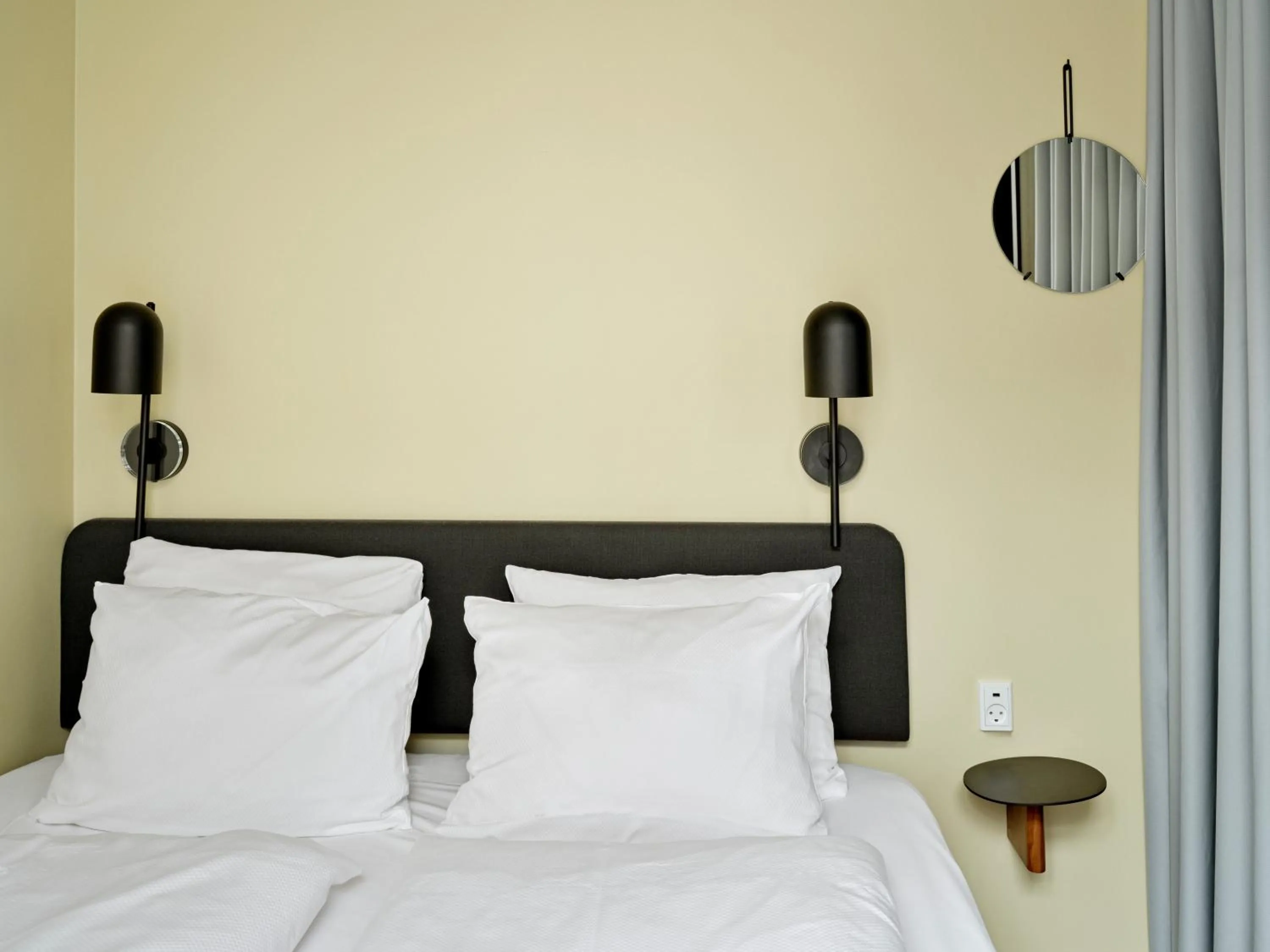 Bed in Apēron Apartment Hotel