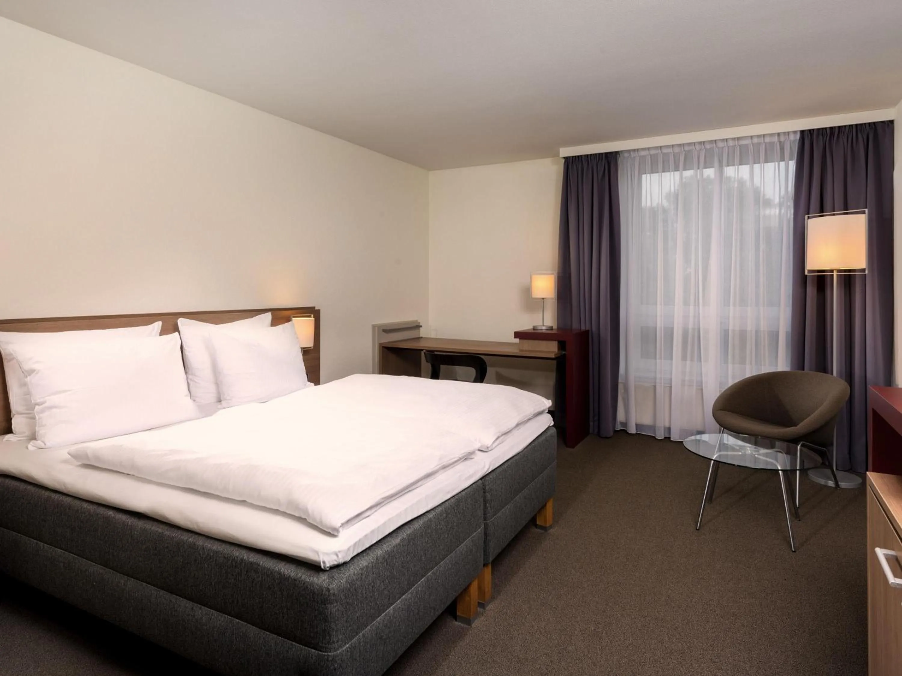 Bedroom, Bed in Mövenpick Hotel Münster am Aasee