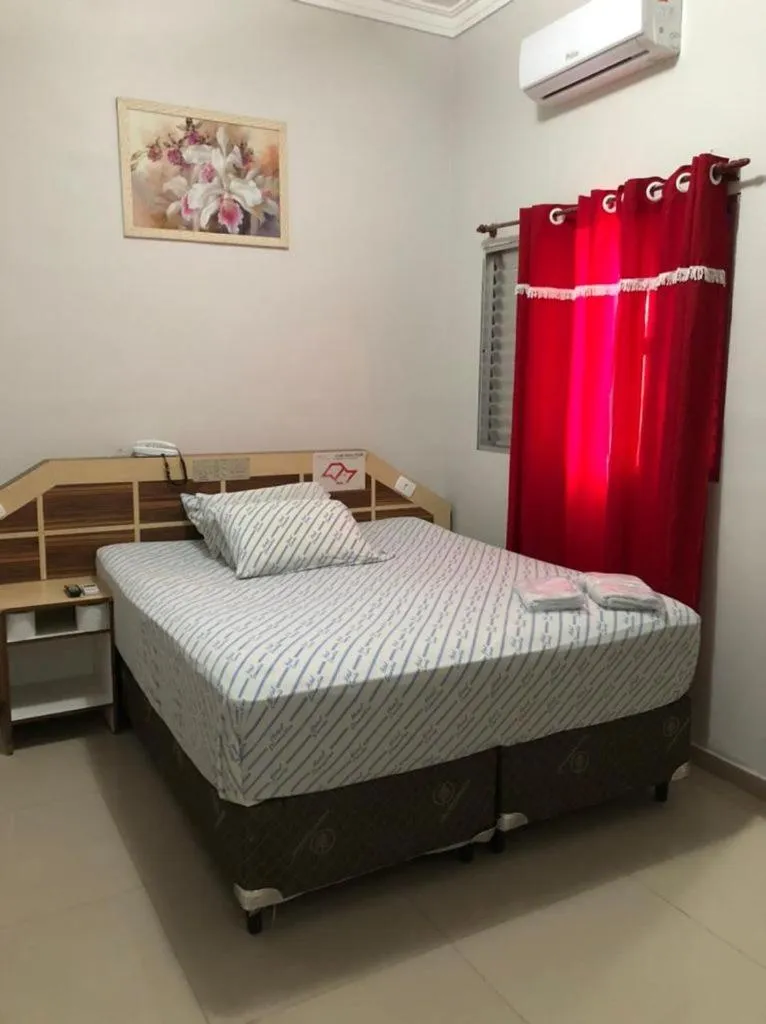 Bed in Hotel Carrão