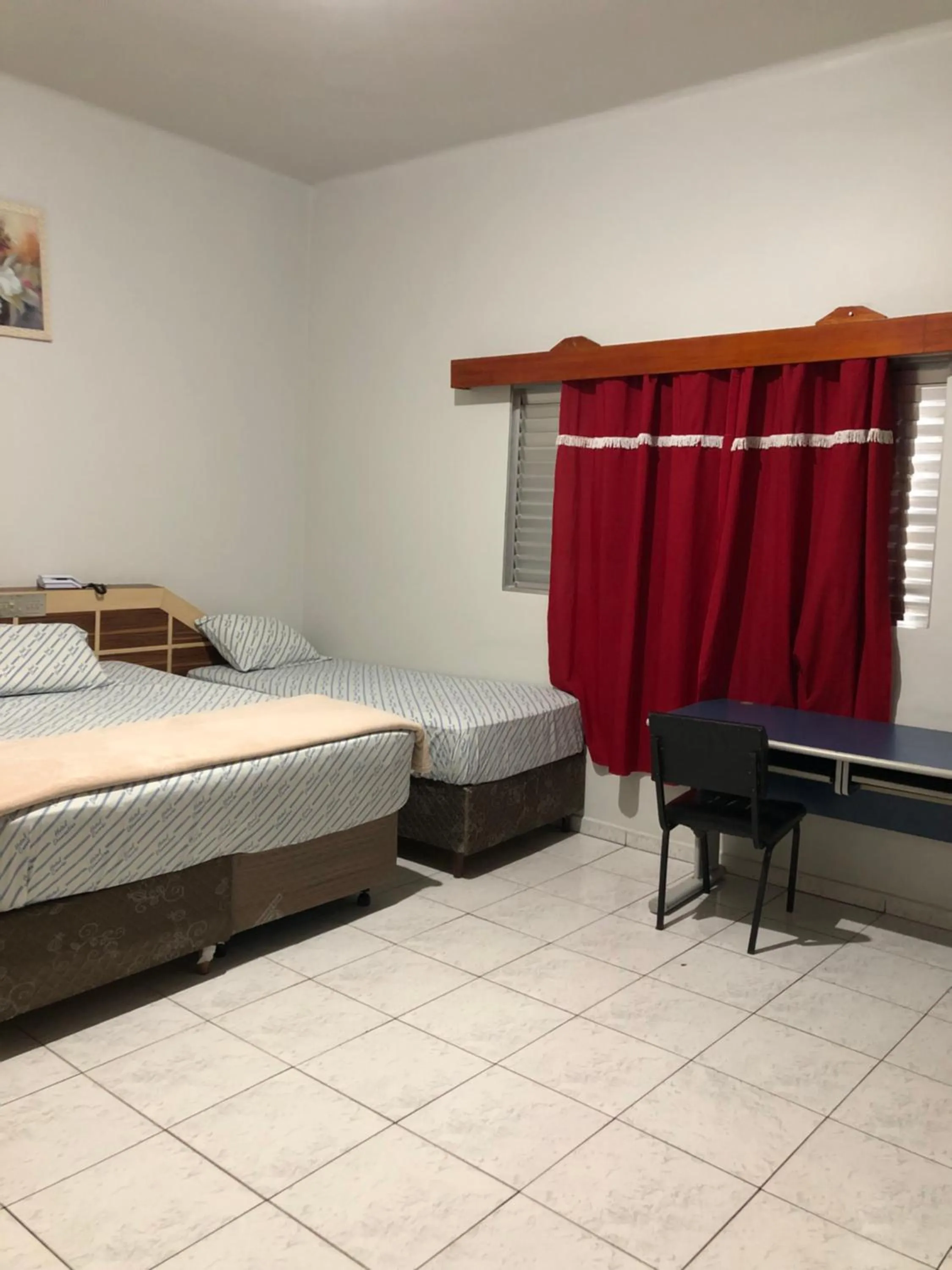 Bed in Hotel Carrão