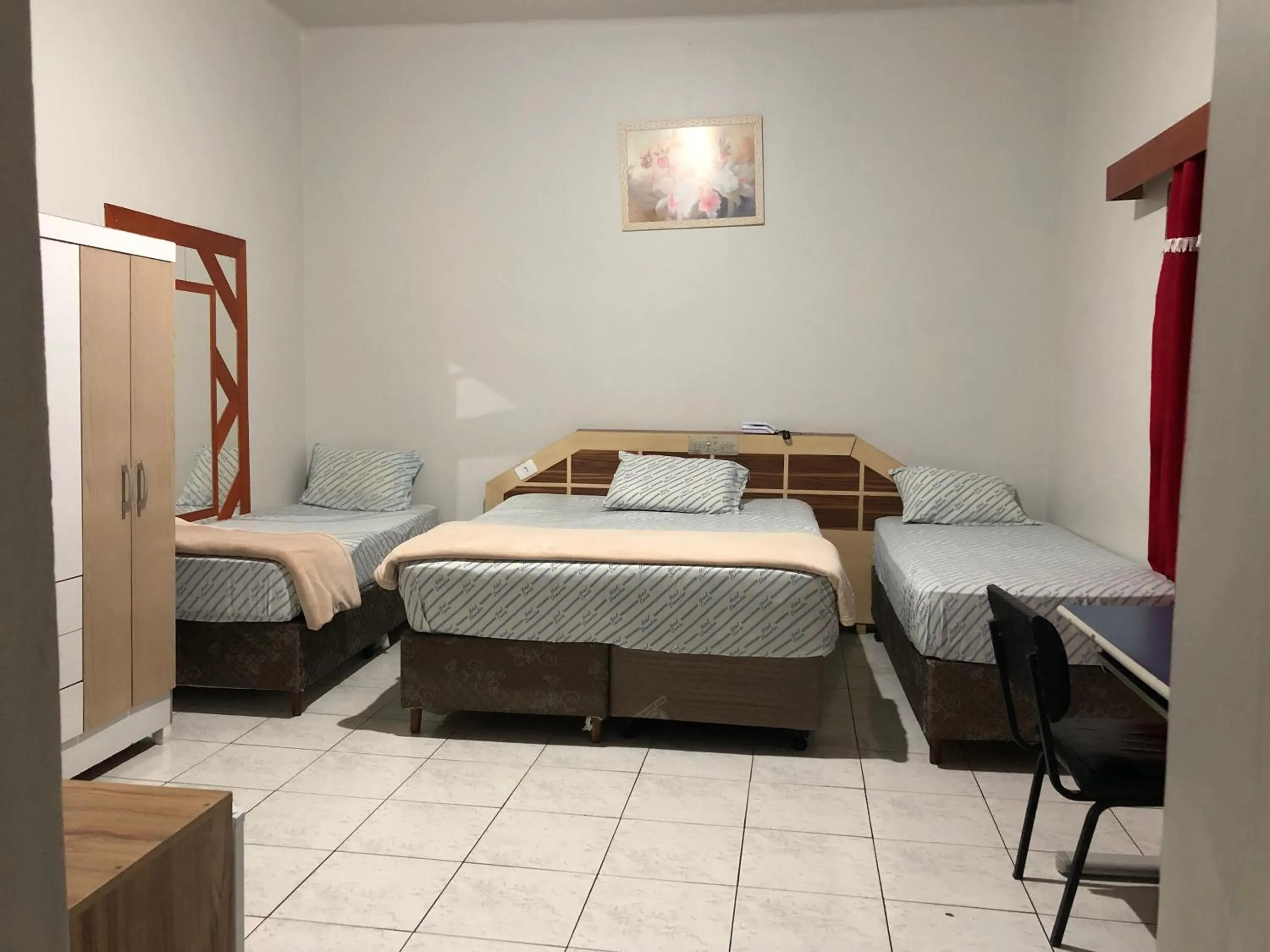 Bed in Hotel Carrão