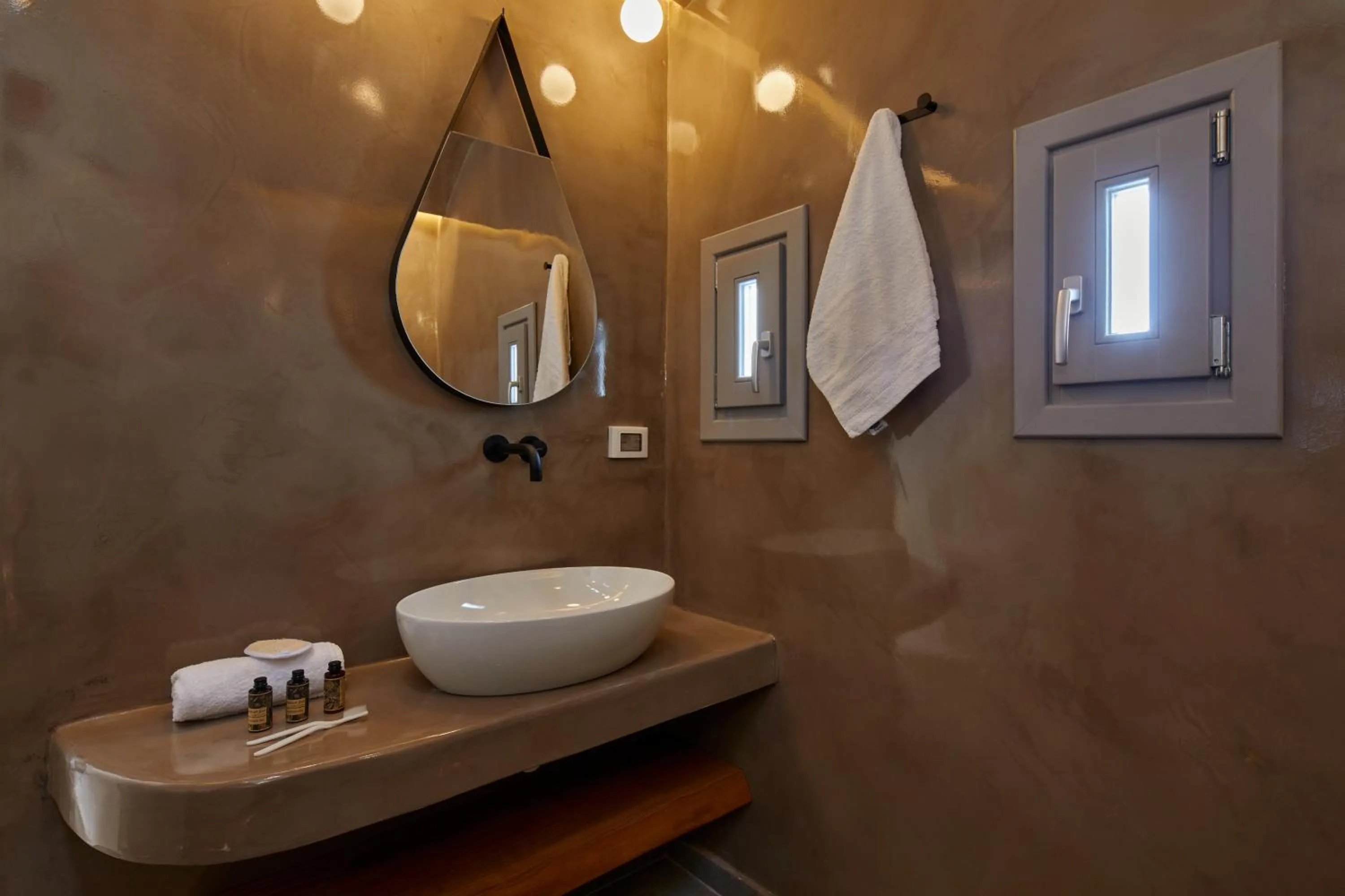 Bathroom in Allure Breeze Suites