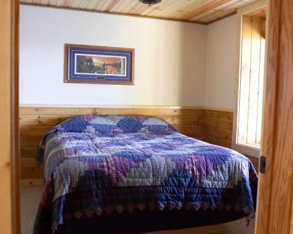 Bed in Riverside Resort