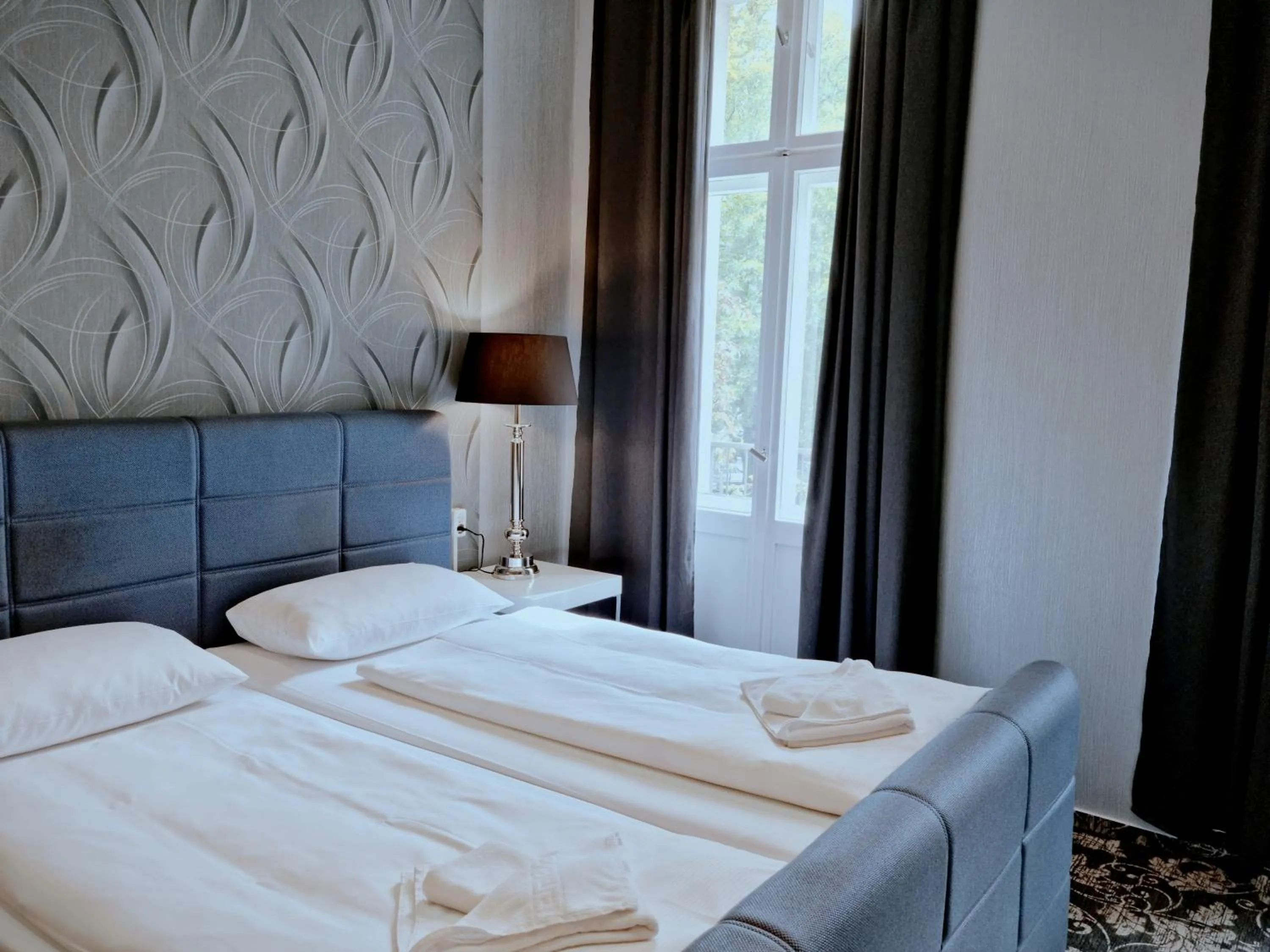 Bed in Hotel Gasteiner Hof