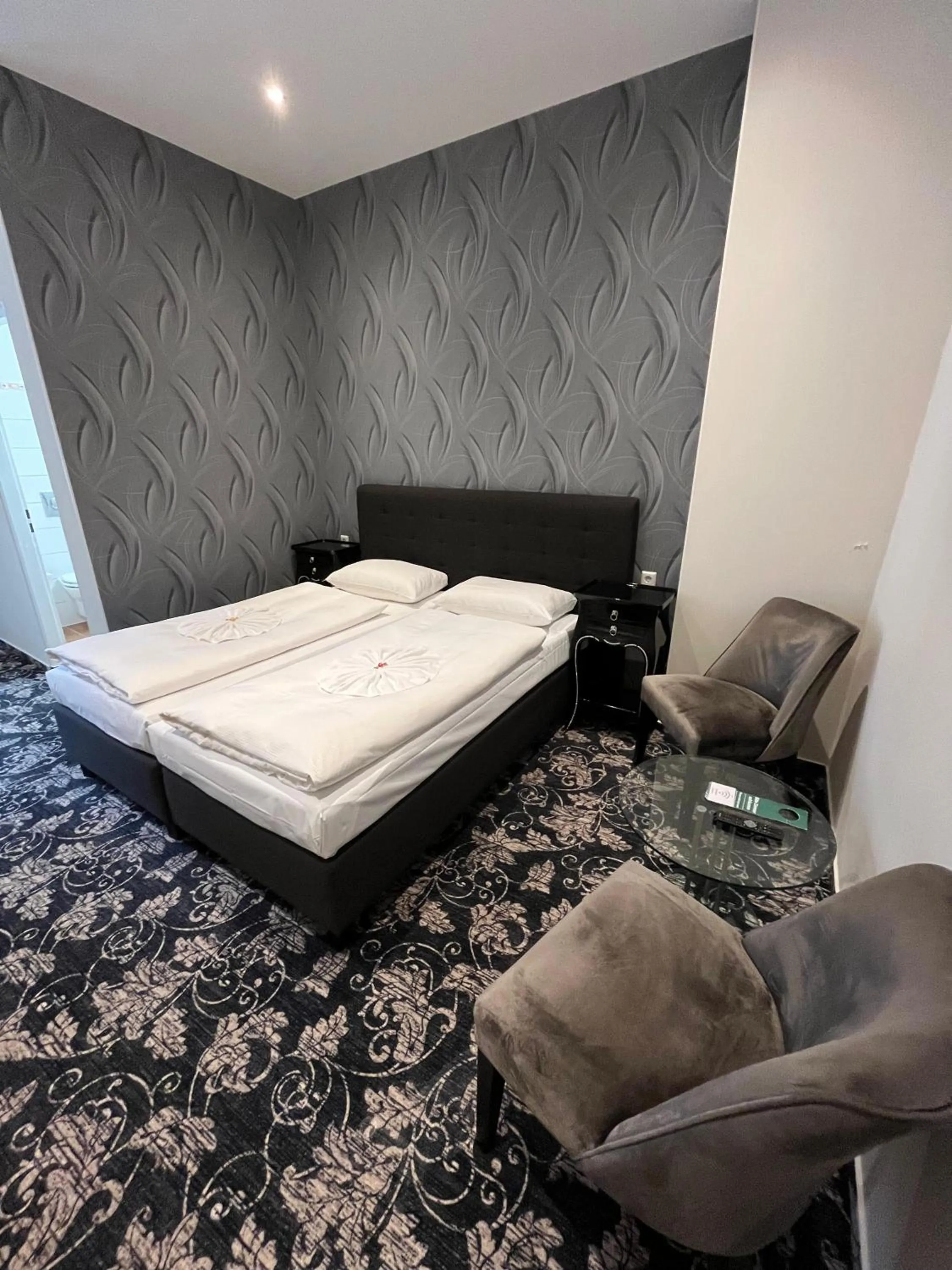 Photo of the whole room, Bed in Hotel Gasteiner Hof