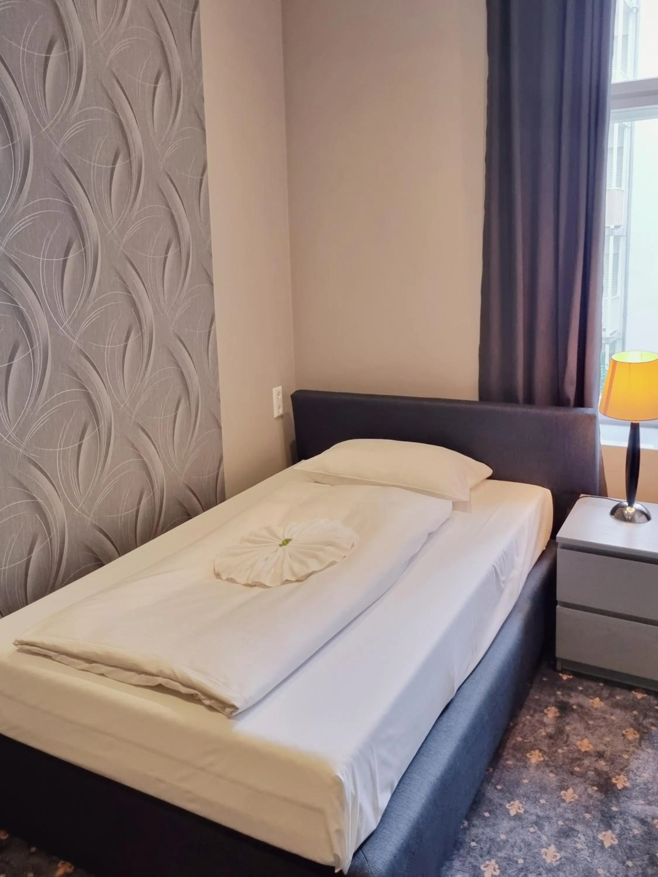 Bed in Hotel Gasteiner Hof