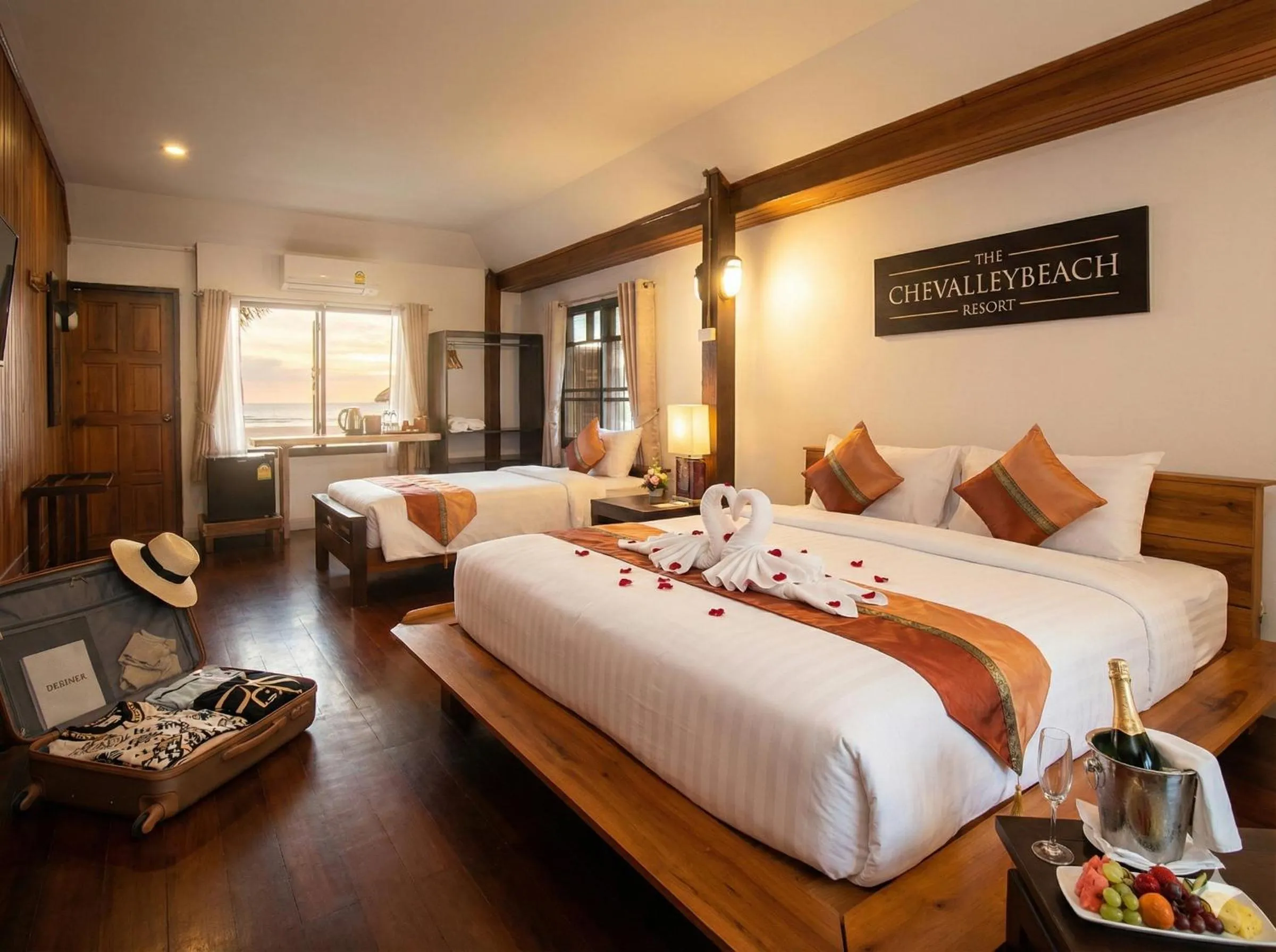 Bed in The Chevalley Beach Resort