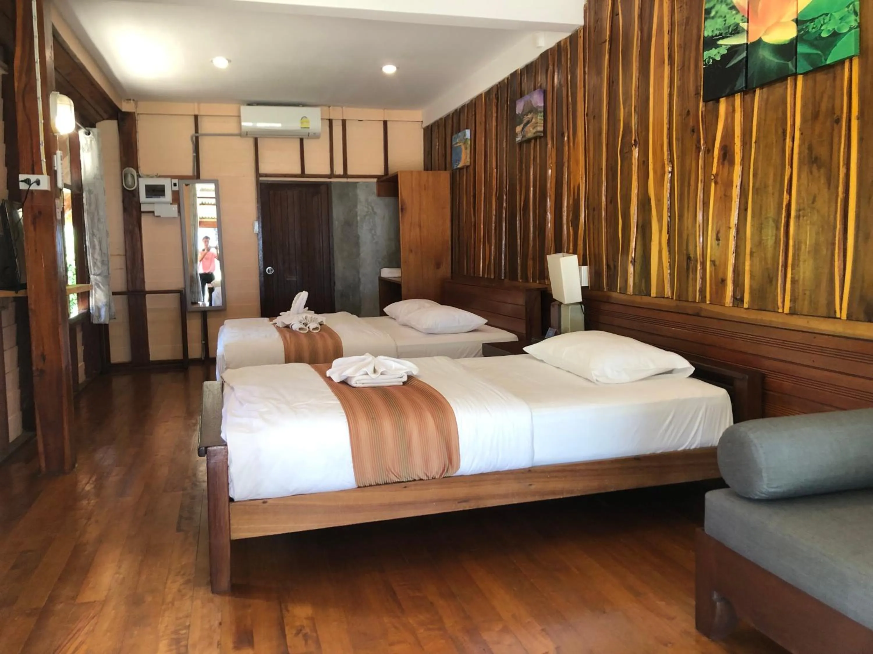 Bed in The Chevalley Beach Resort