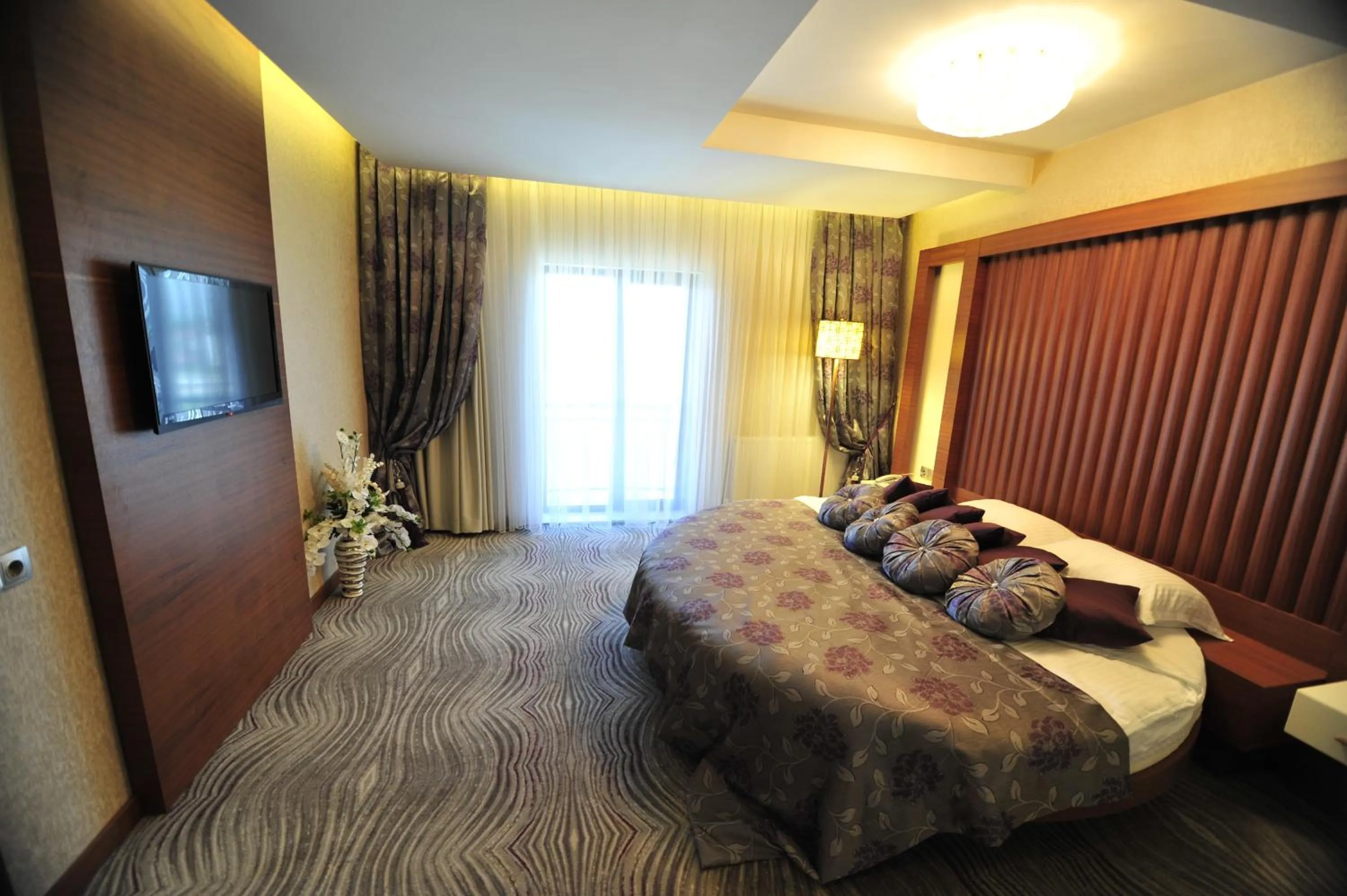 Bed in Grand Cenas Hotel