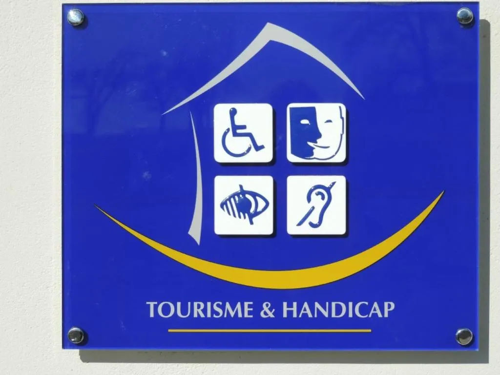 Property logo or sign in Maison d'hôtes Marimpoey