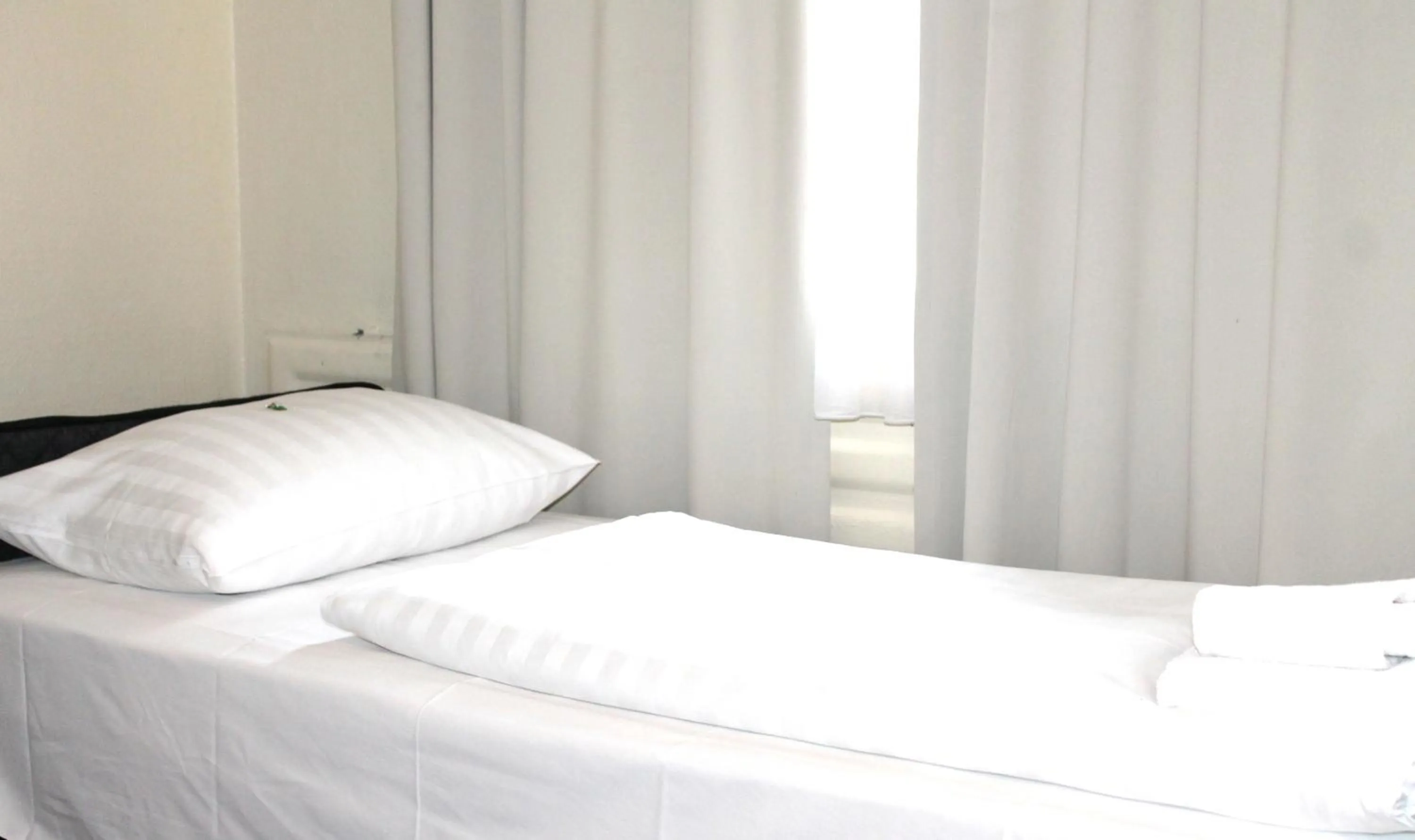 Bed in Monopol Hotel