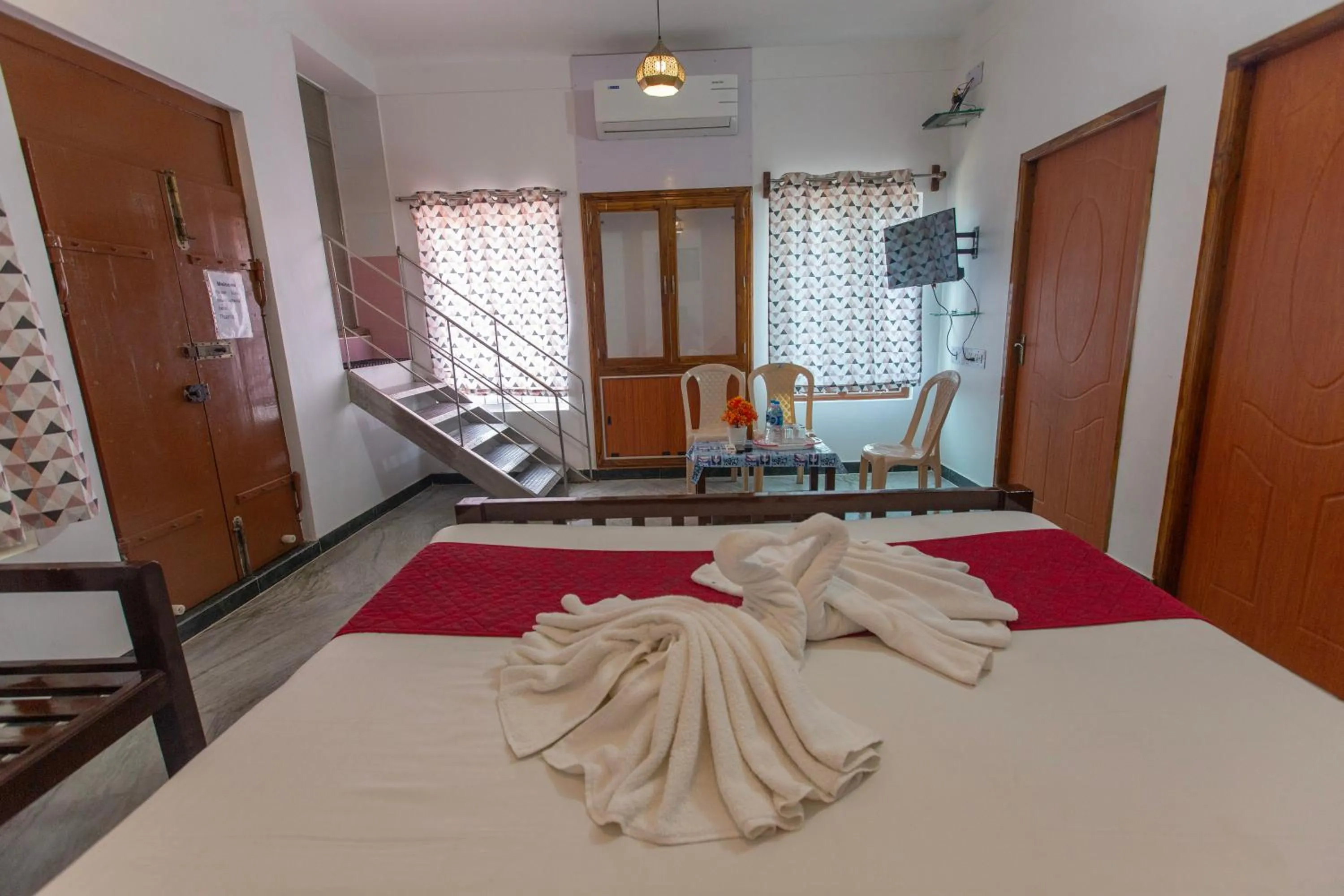 Seating area, Bed in Sunflower Villa