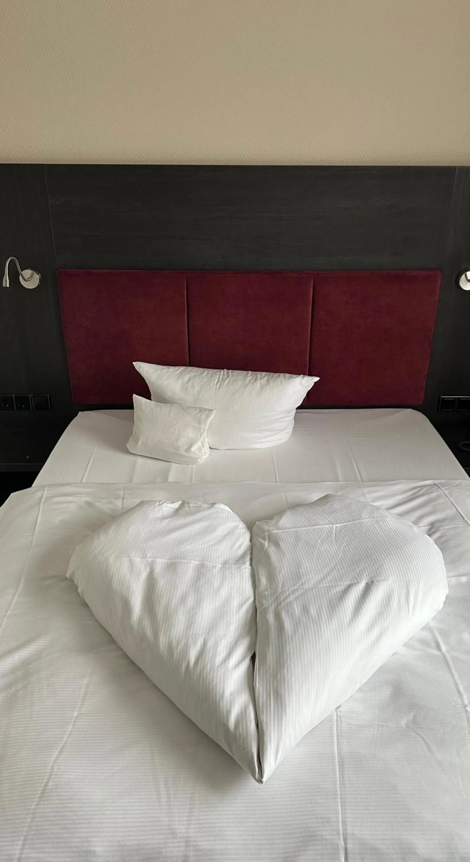 Bed in Astralis Hotel Domizil
