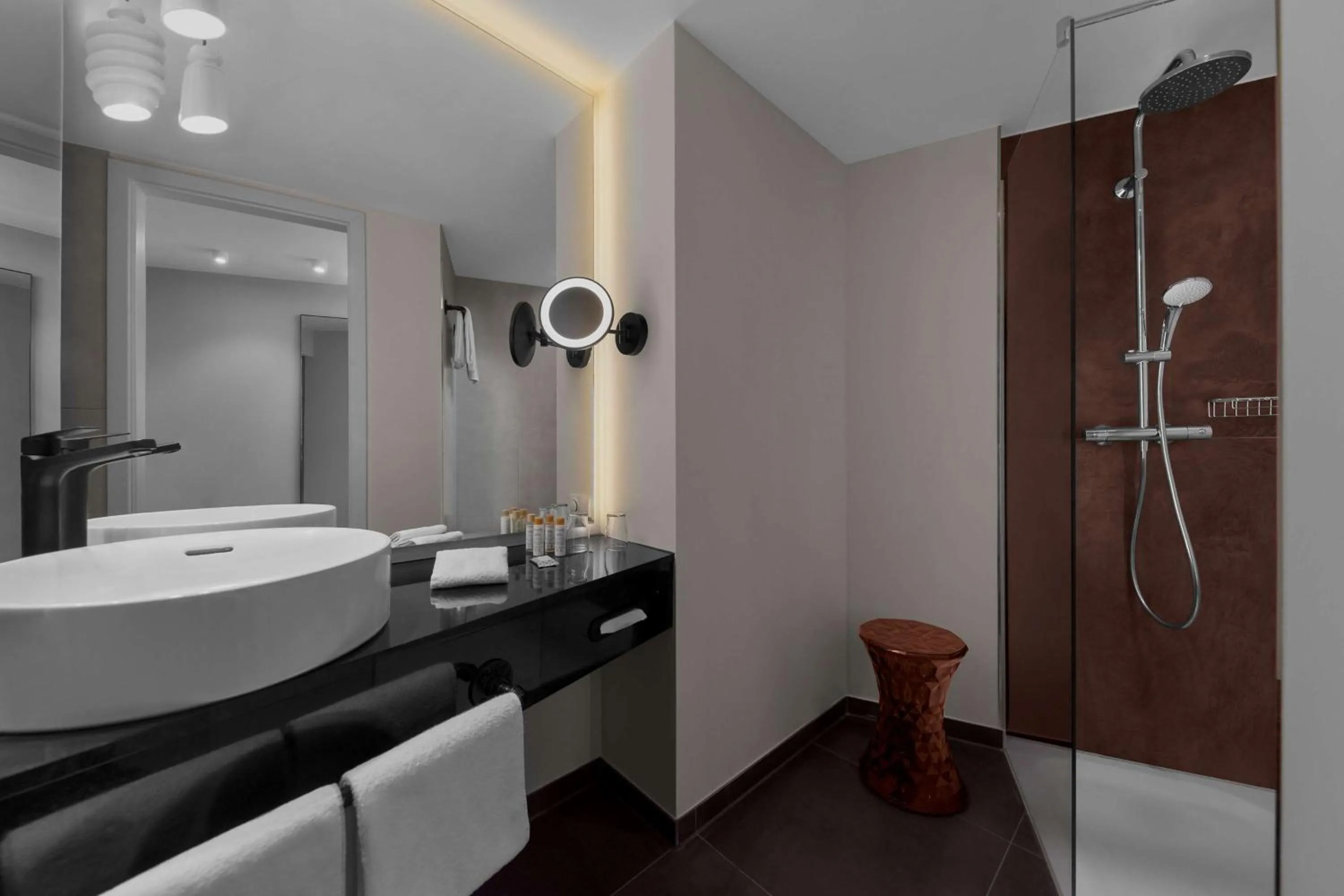 Bathroom in Wasserturm Hotel Cologne, Curio Collection by Hilton