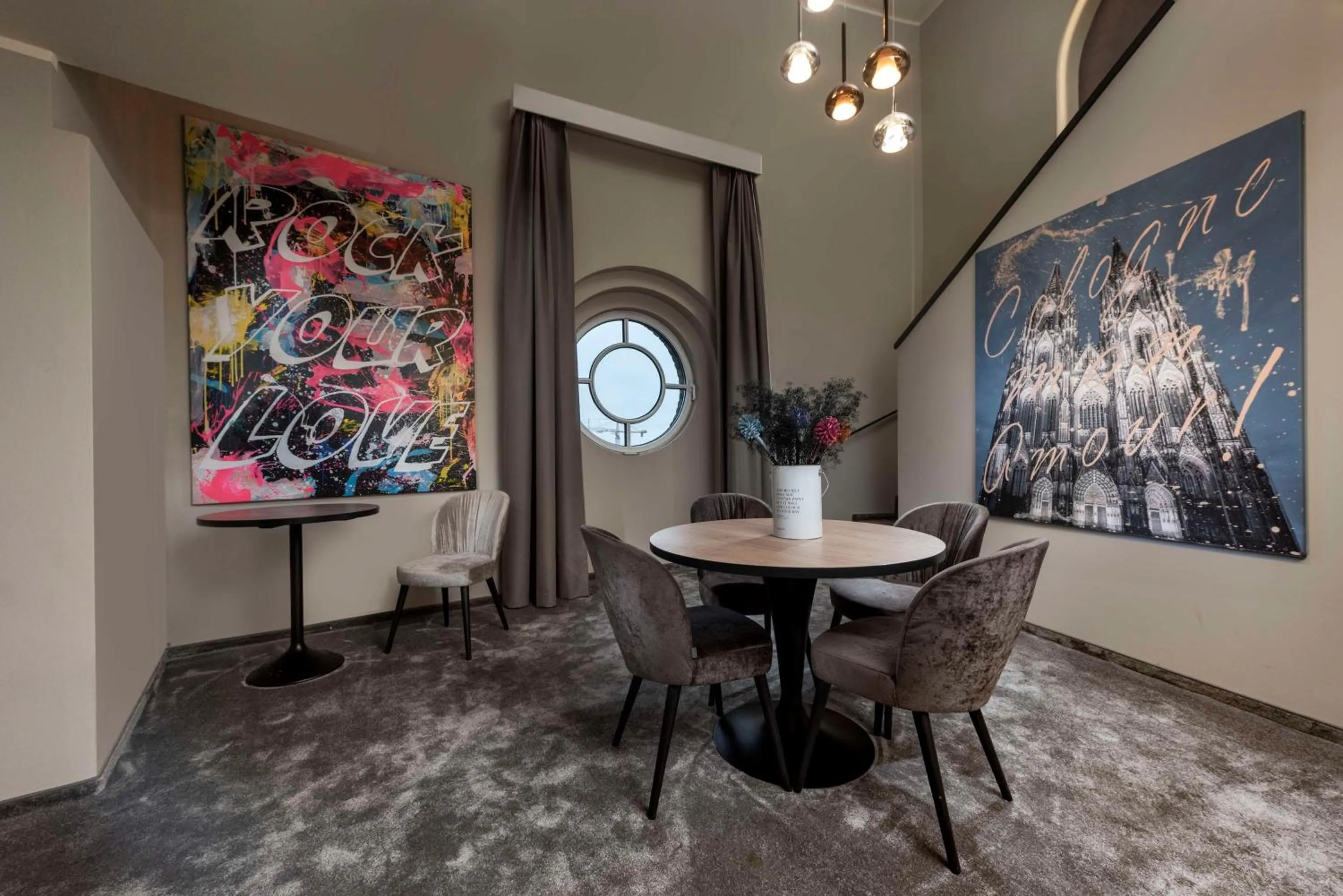 Photo of the whole room in Wasserturm Hotel Cologne, Curio Collection by Hilton