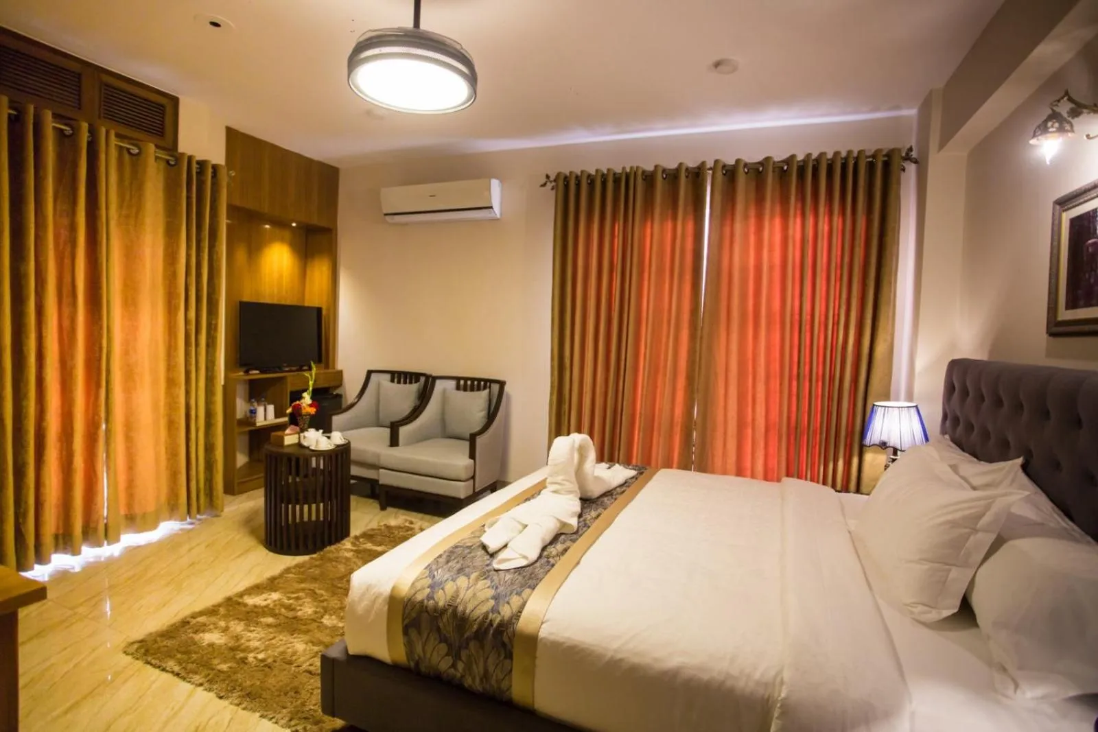 Bed in Shinepukur Suites