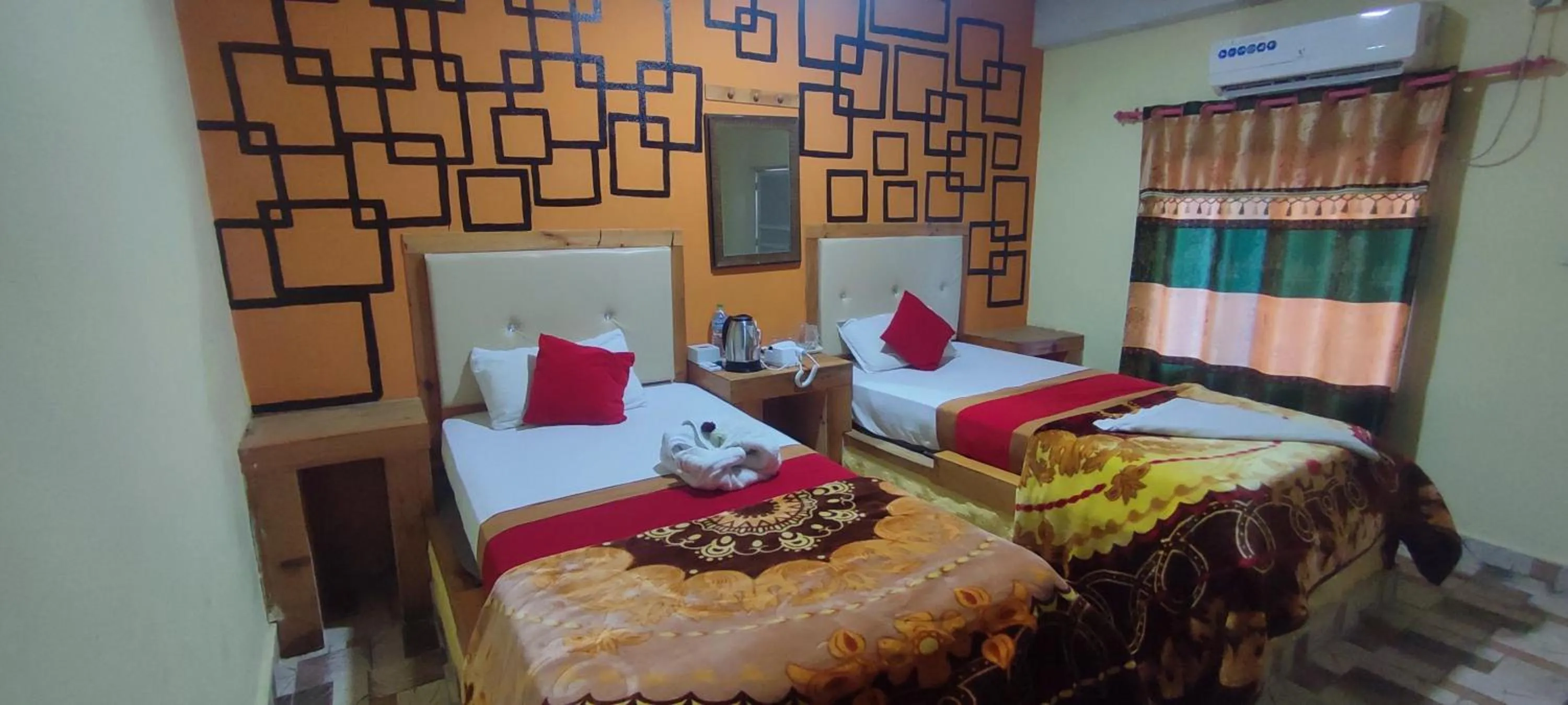 Bed in Hong Qi Hotel