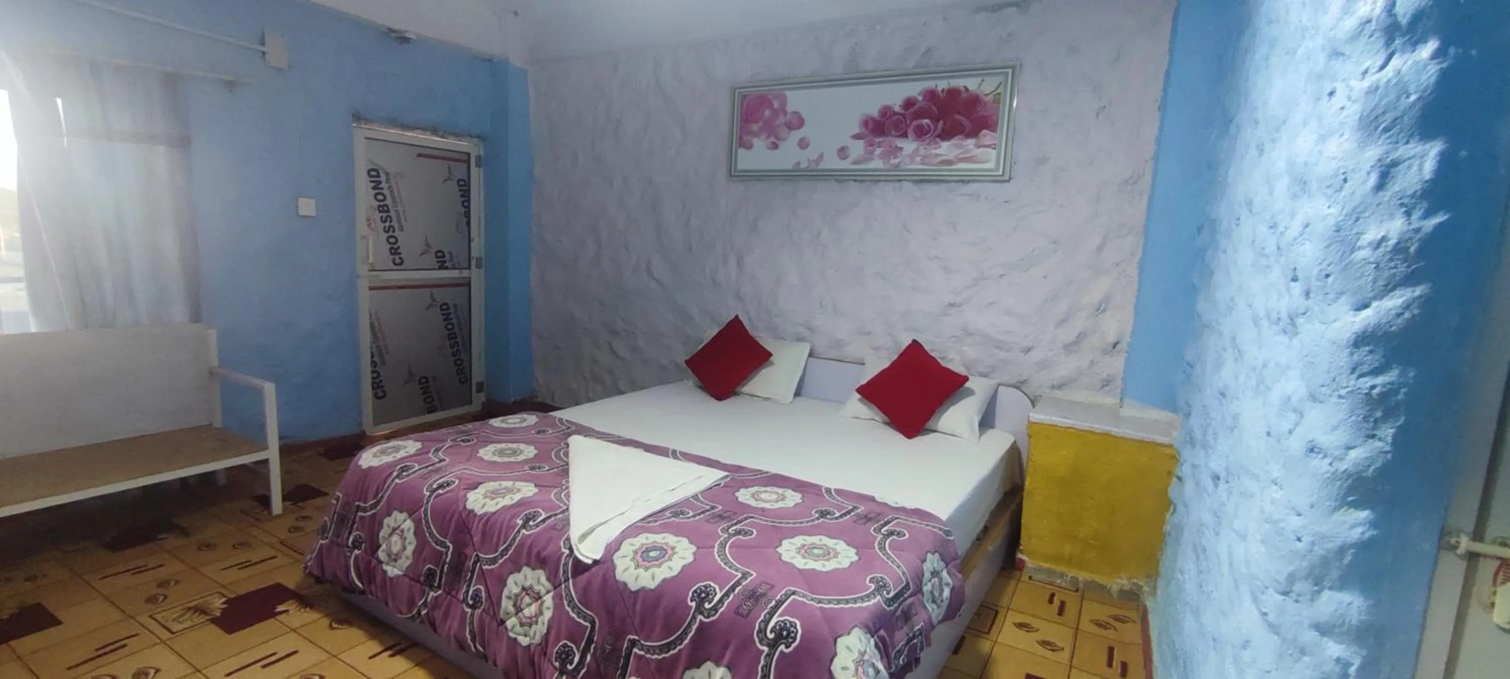 Bed in Hong Qi Hotel