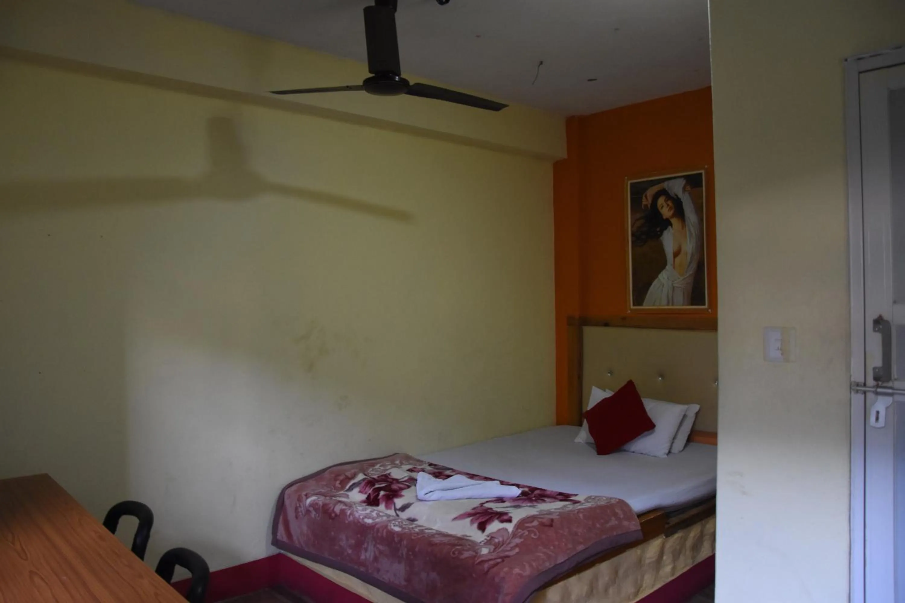 Bed in Hong Qi Hotel