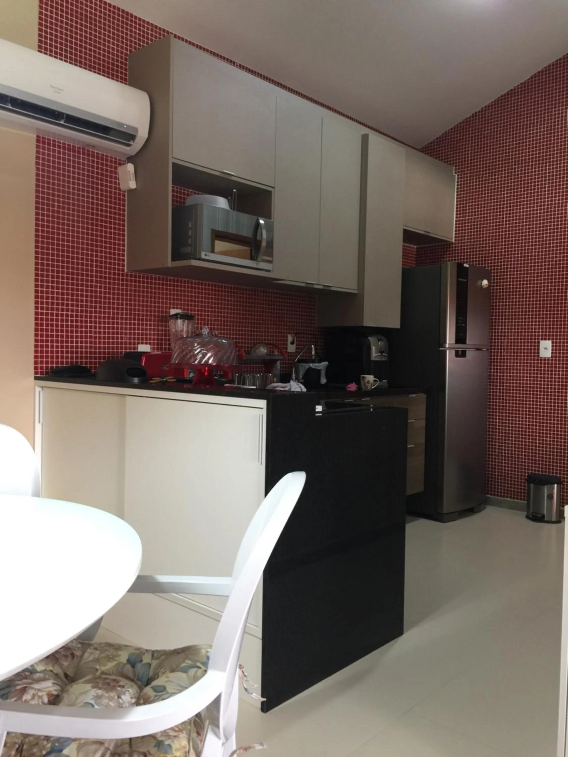 Communal kitchen in Flat Oka beach residence luxo