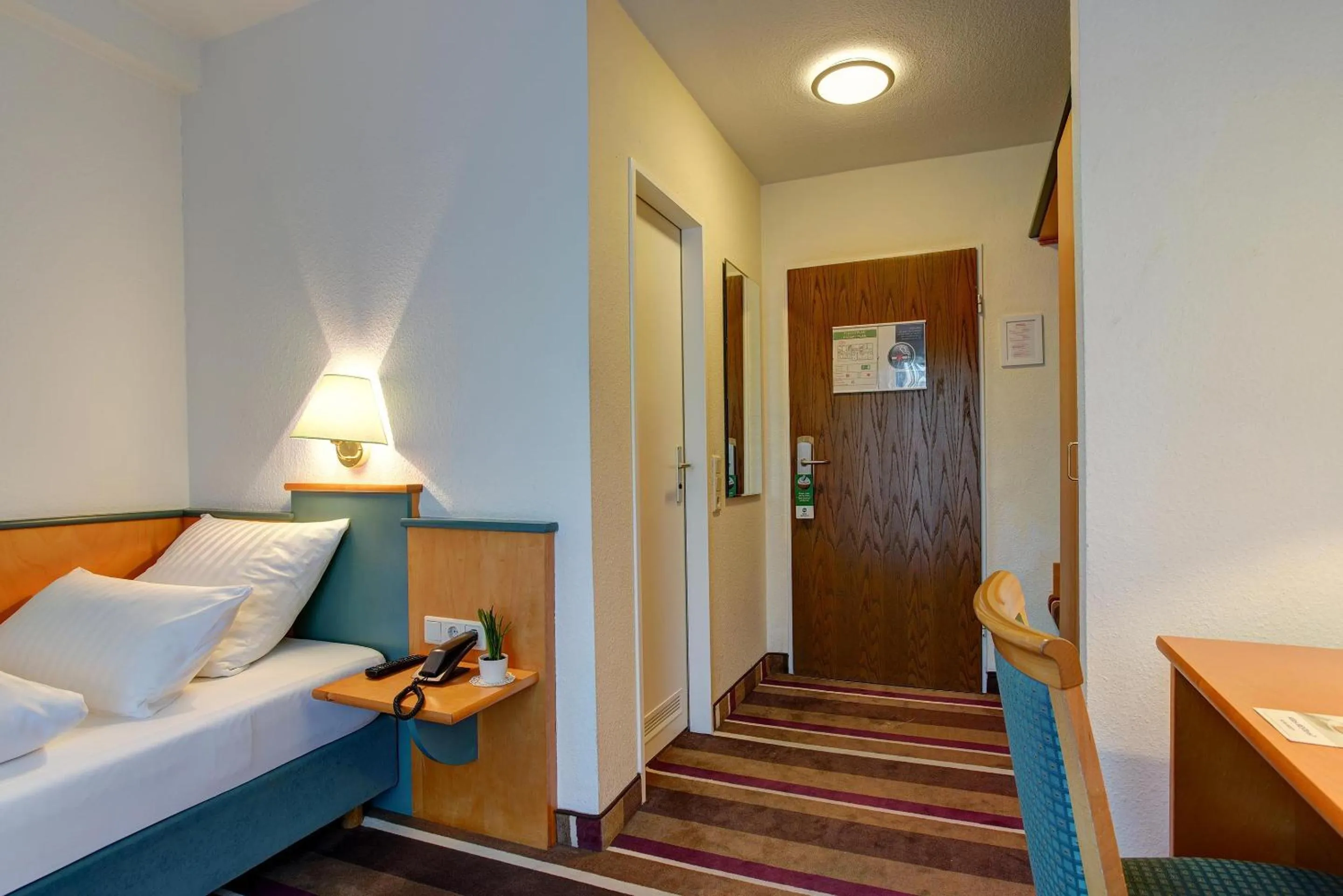 Bedroom, Bed in Sure Hotel by Best Western Ambassador Duesseldorf