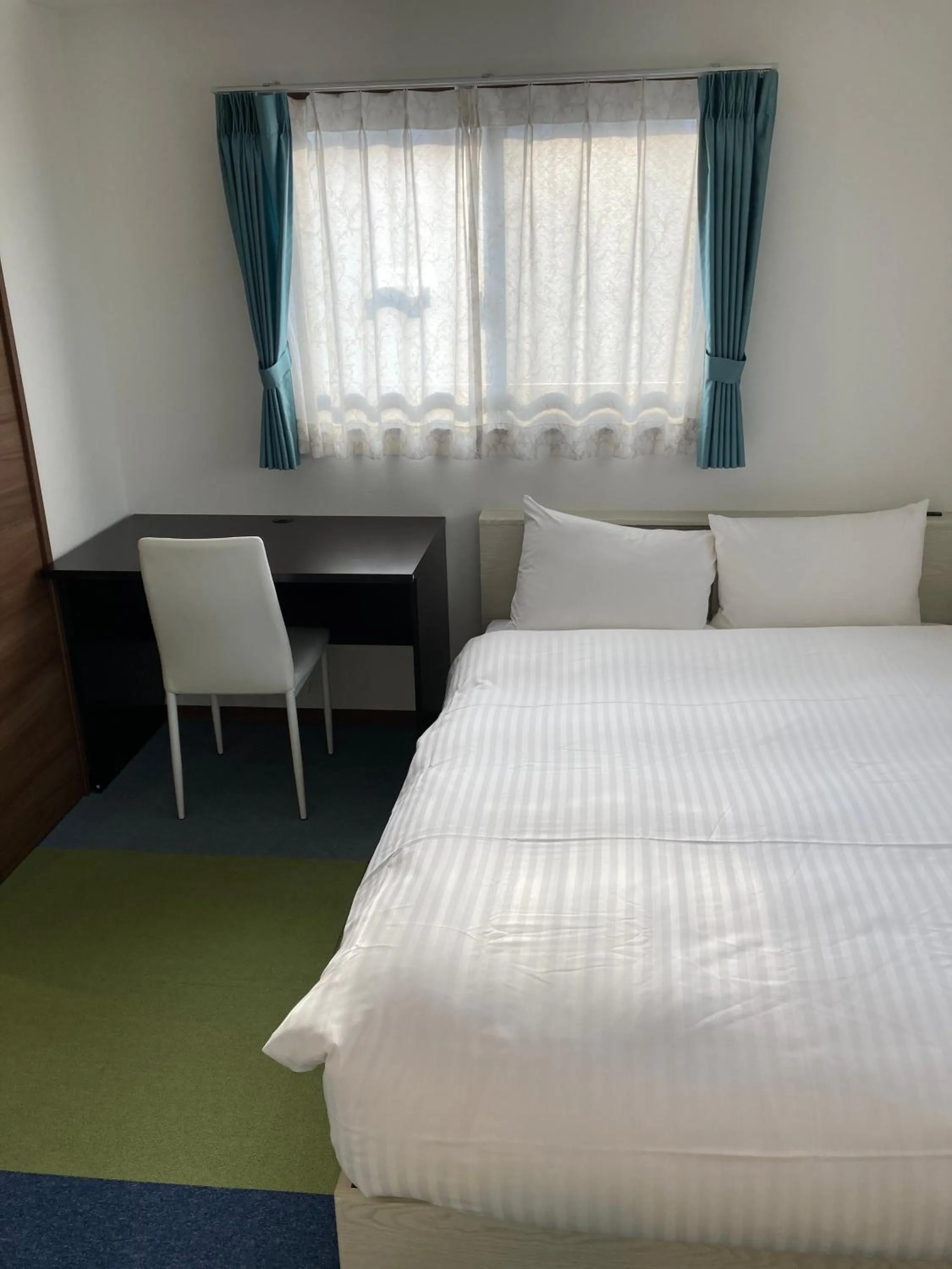 Bed in A.T. Hotel Hakata