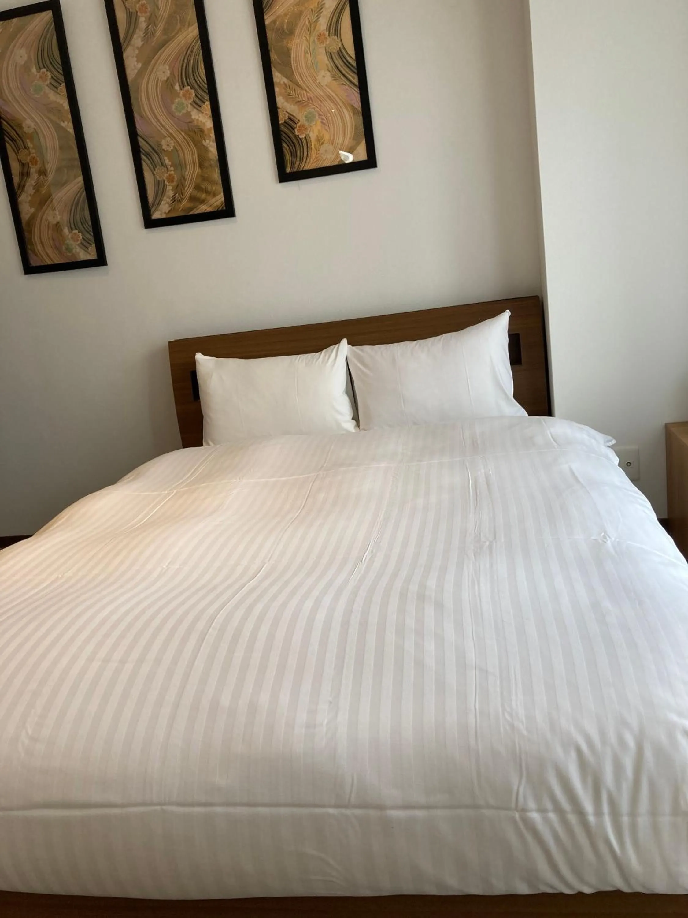 Bed in A.T. Hotel Hakata