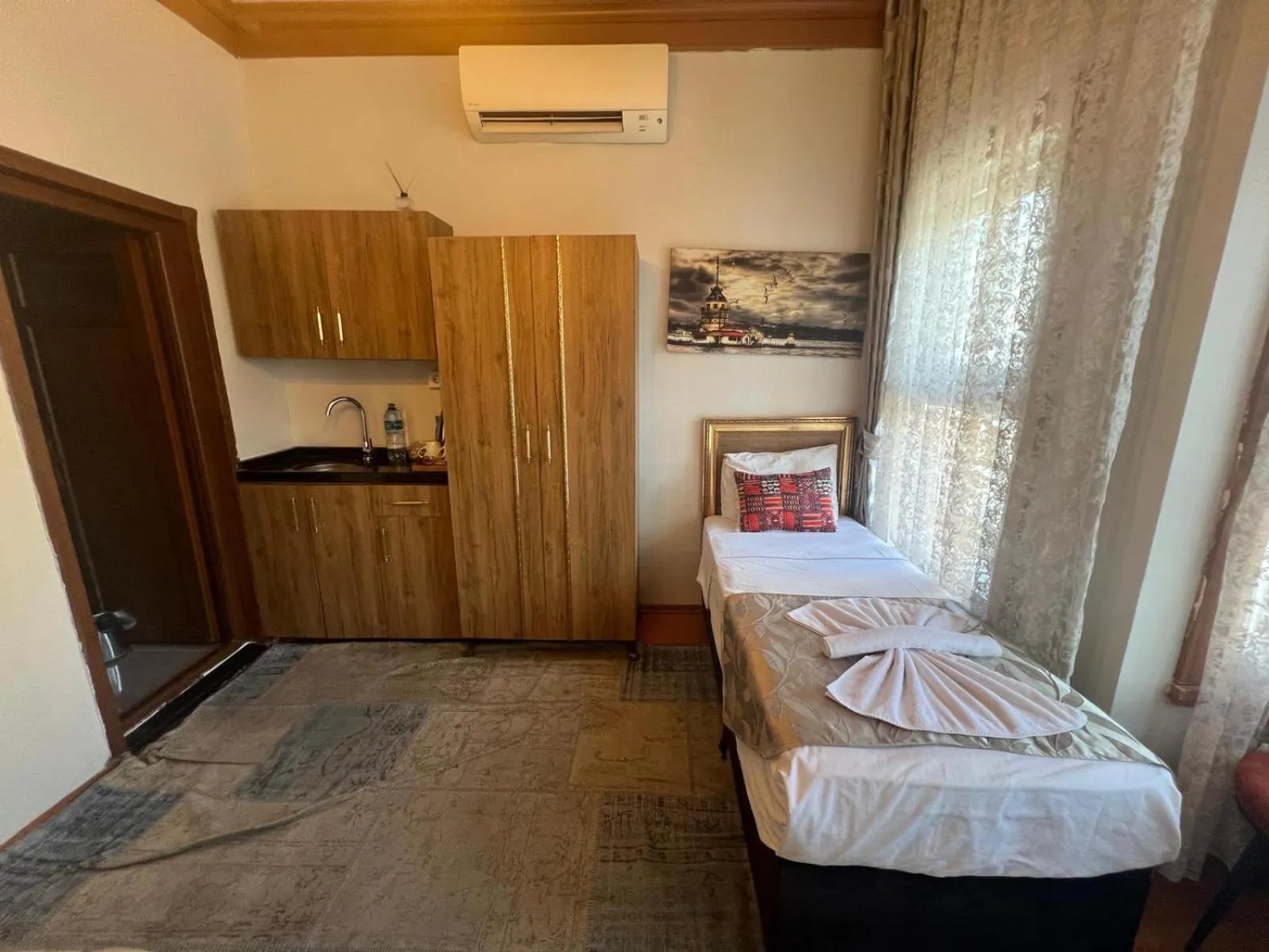 Kitchen or kitchenette, Bed in April Story Apart Hotel